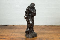 Vintage Bronze Sculpture Depicting a Mythical Warrior Holding a Flask