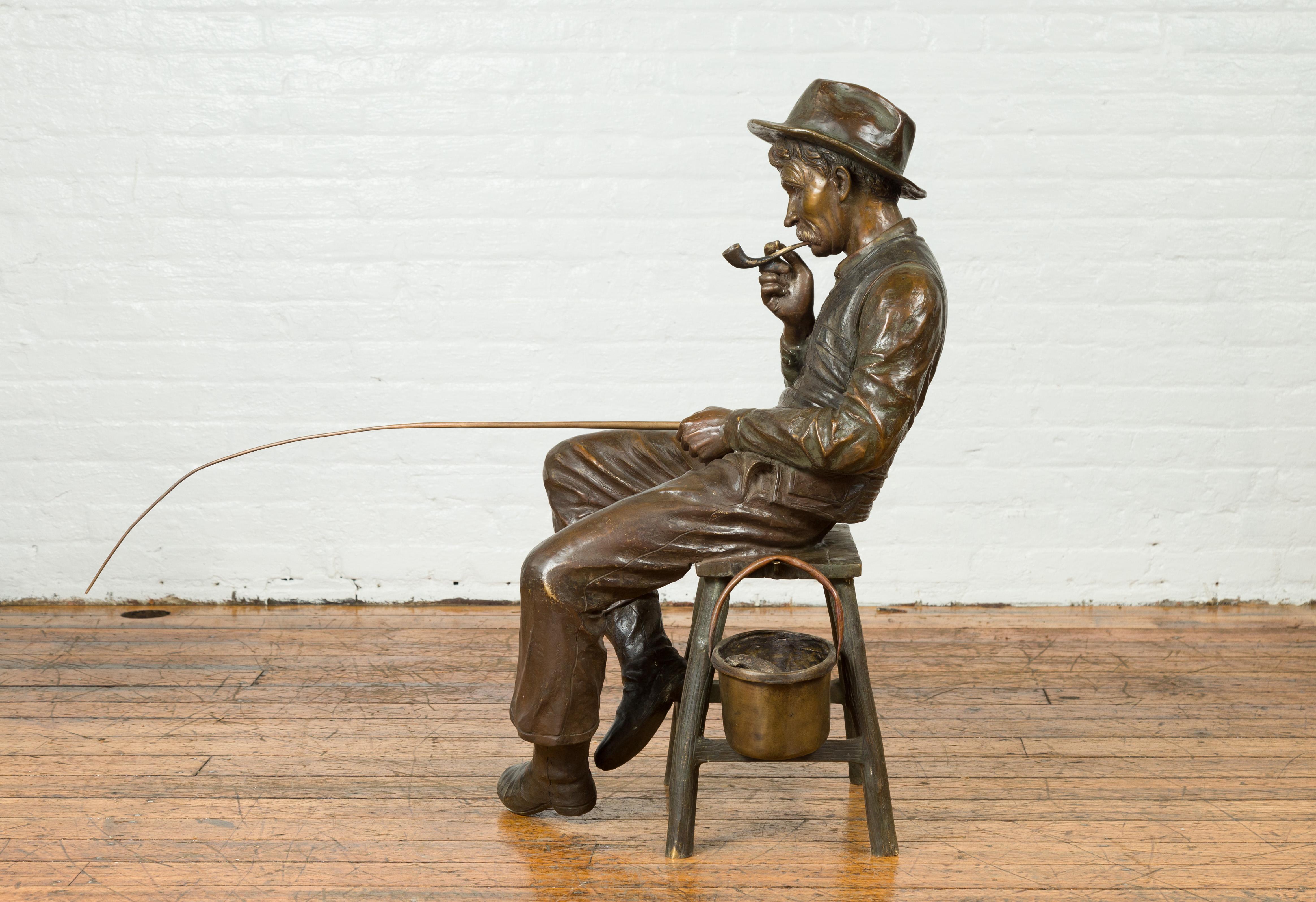 20th Century Vintage Bronze Sculpture of a Sitting Old Timer Smoking His Pipe and Fishing