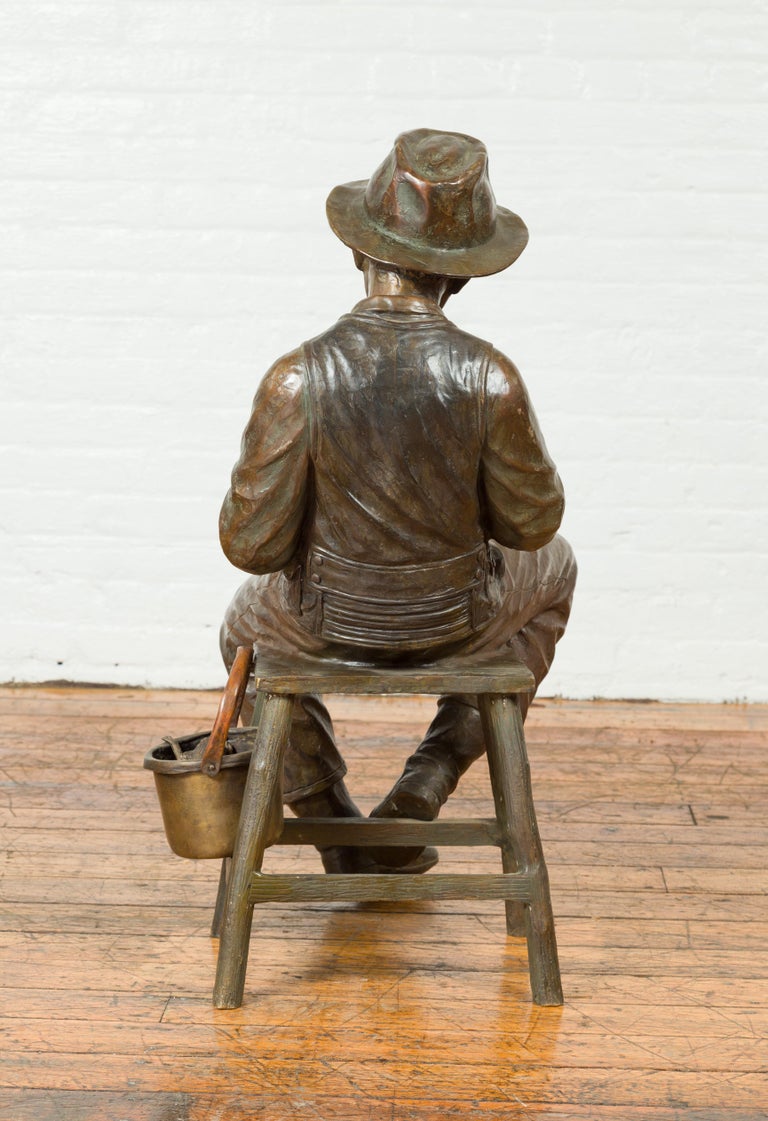 Vintage Bronze Sculpture of a Sitting Old Timer Smoking His Pipe and
