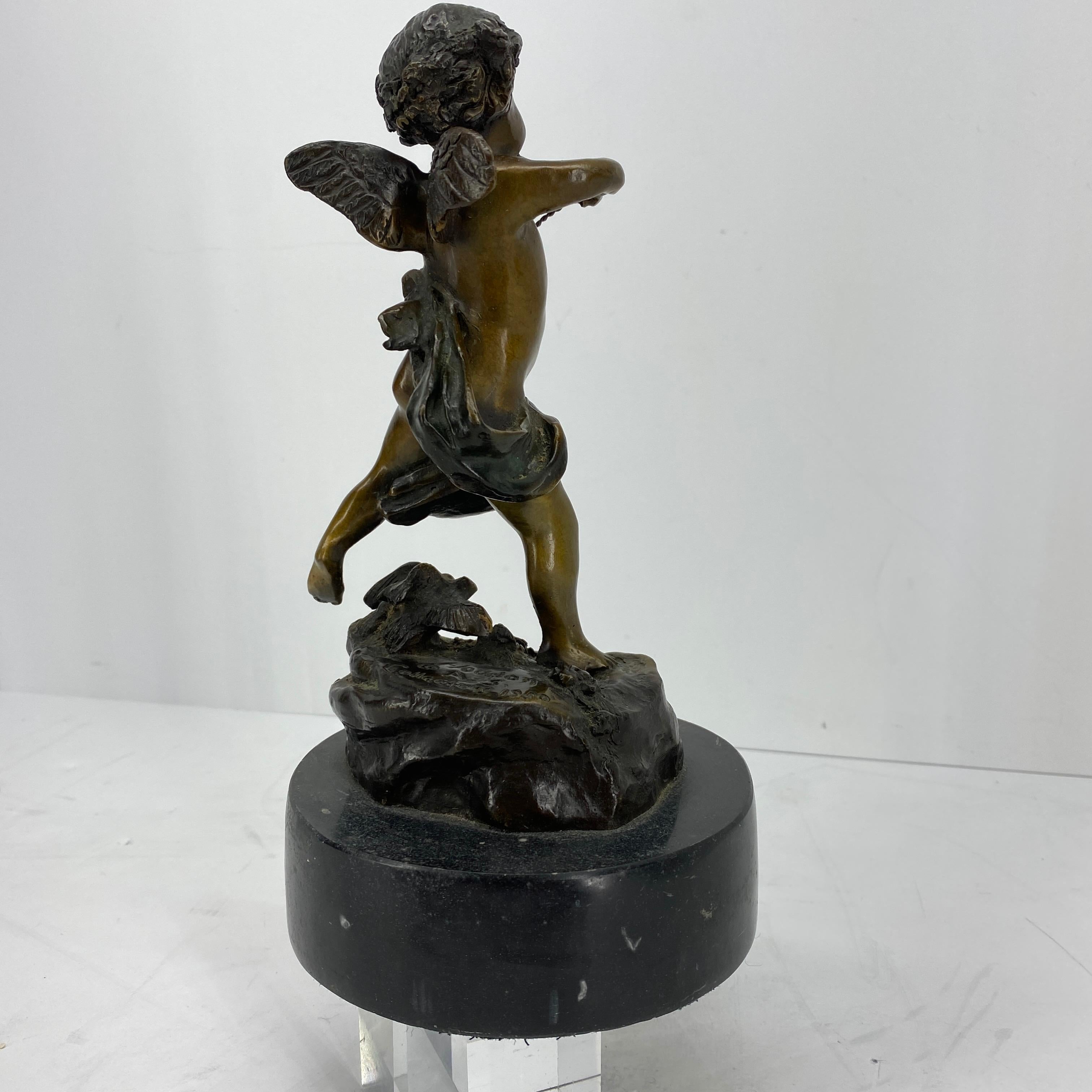 American Vintage Bronze Sculpture of Cupid on Black Marble Base after Houdon