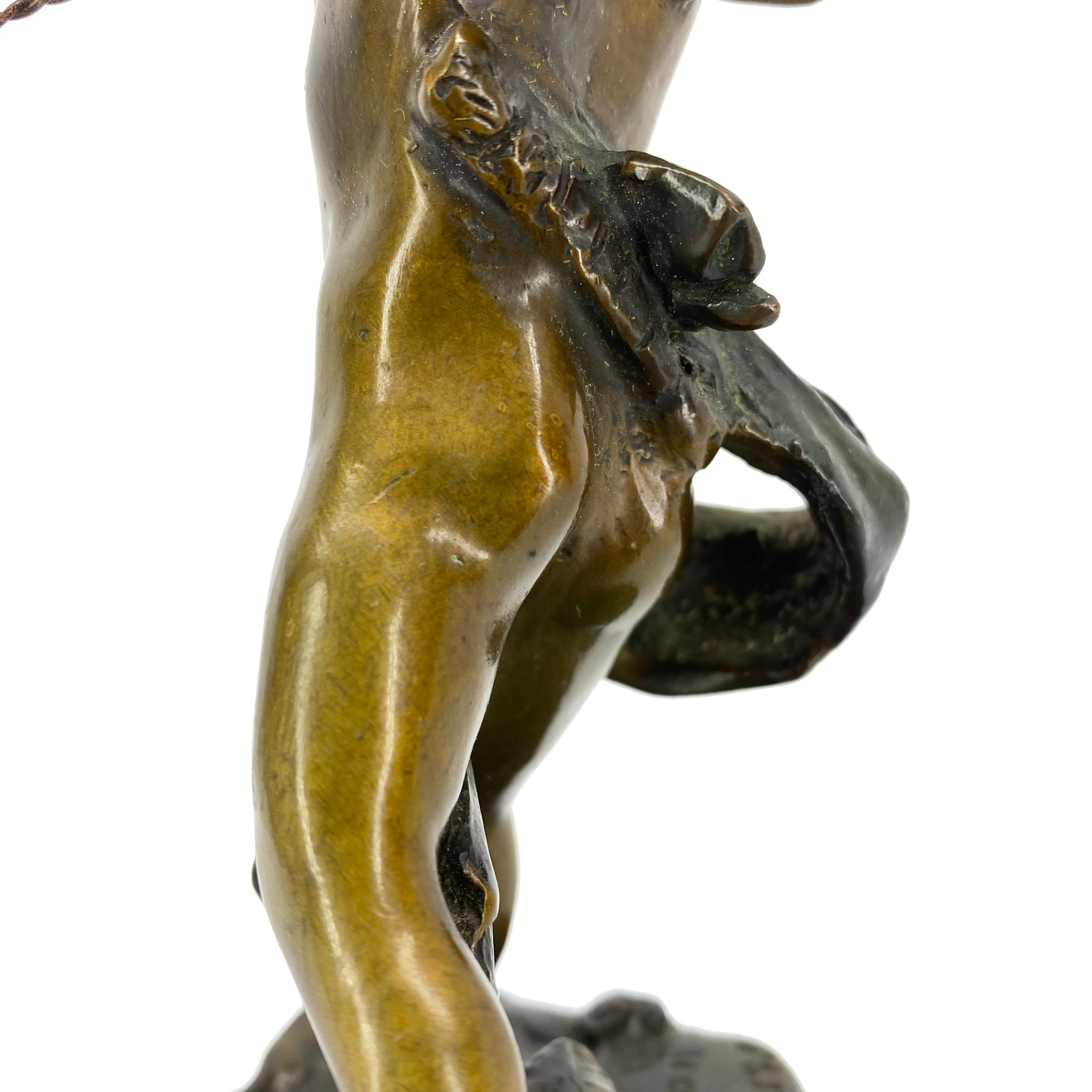 Hand-Crafted Vintage Bronze Sculpture of Cupid on Black Marble Base after Houdon