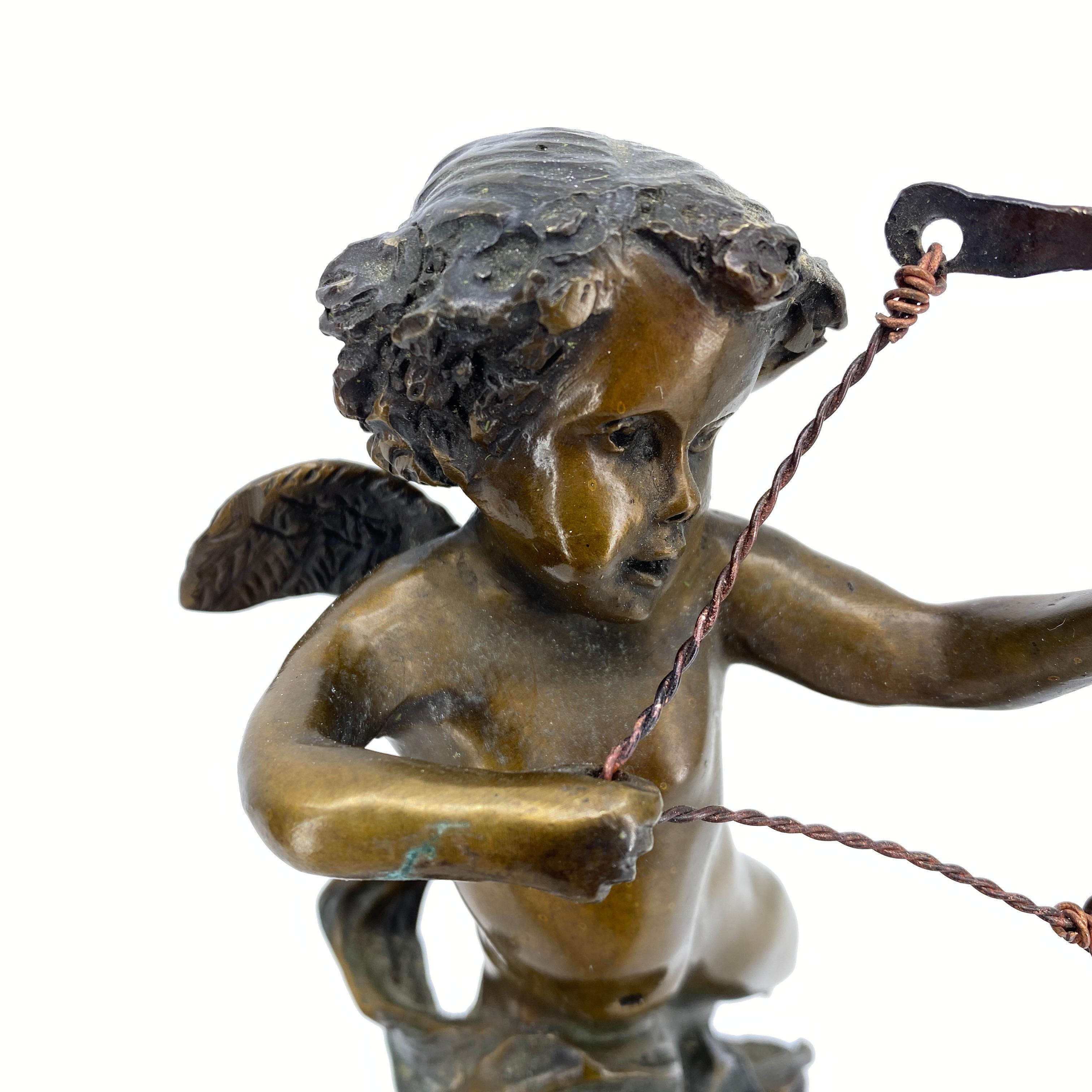 Vintage Bronze Sculpture of Cupid on Black Marble Base after Houdon In Good Condition In Haddonfield, NJ