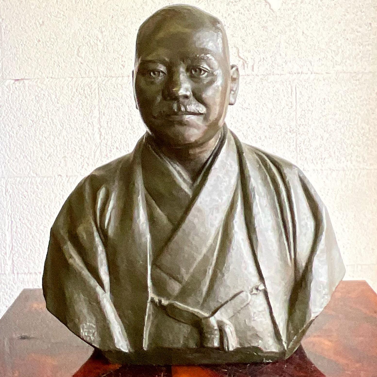 Gorgeous vintage bronze sculpture of a handsome Asian man. Beautiful detail in a chic layered kimono. Signed in Chinese characters on back. Acquired from a Palm Beach estate.