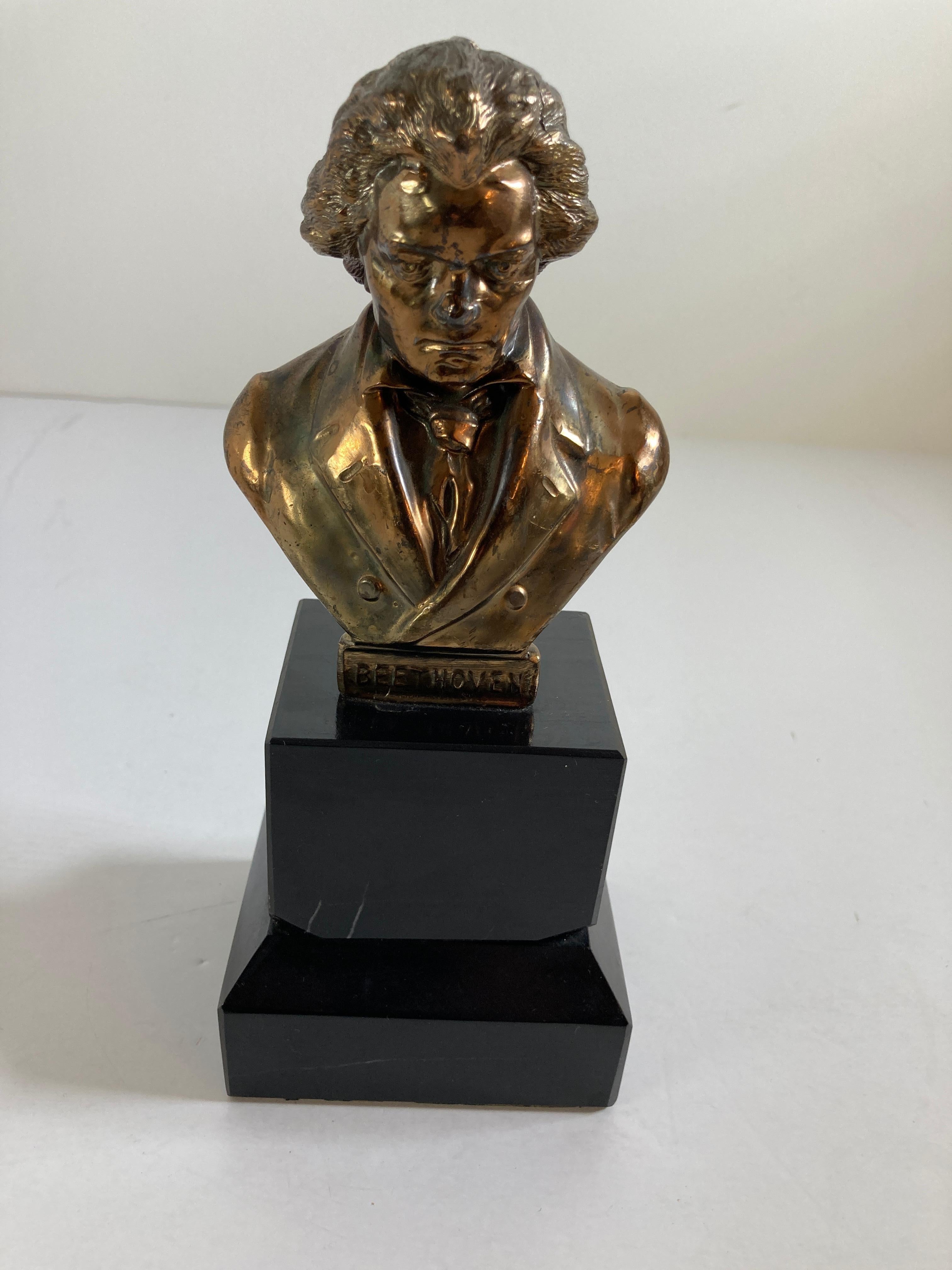 Vintage cast bronze metal sculpture of Ludwig von Beethoven on a marble stand.
Heavy and nice sculpture bust of one of the most prominent musician in all time,
circa mid-20th century.
This is a vintage sculpture of the masterful classical music