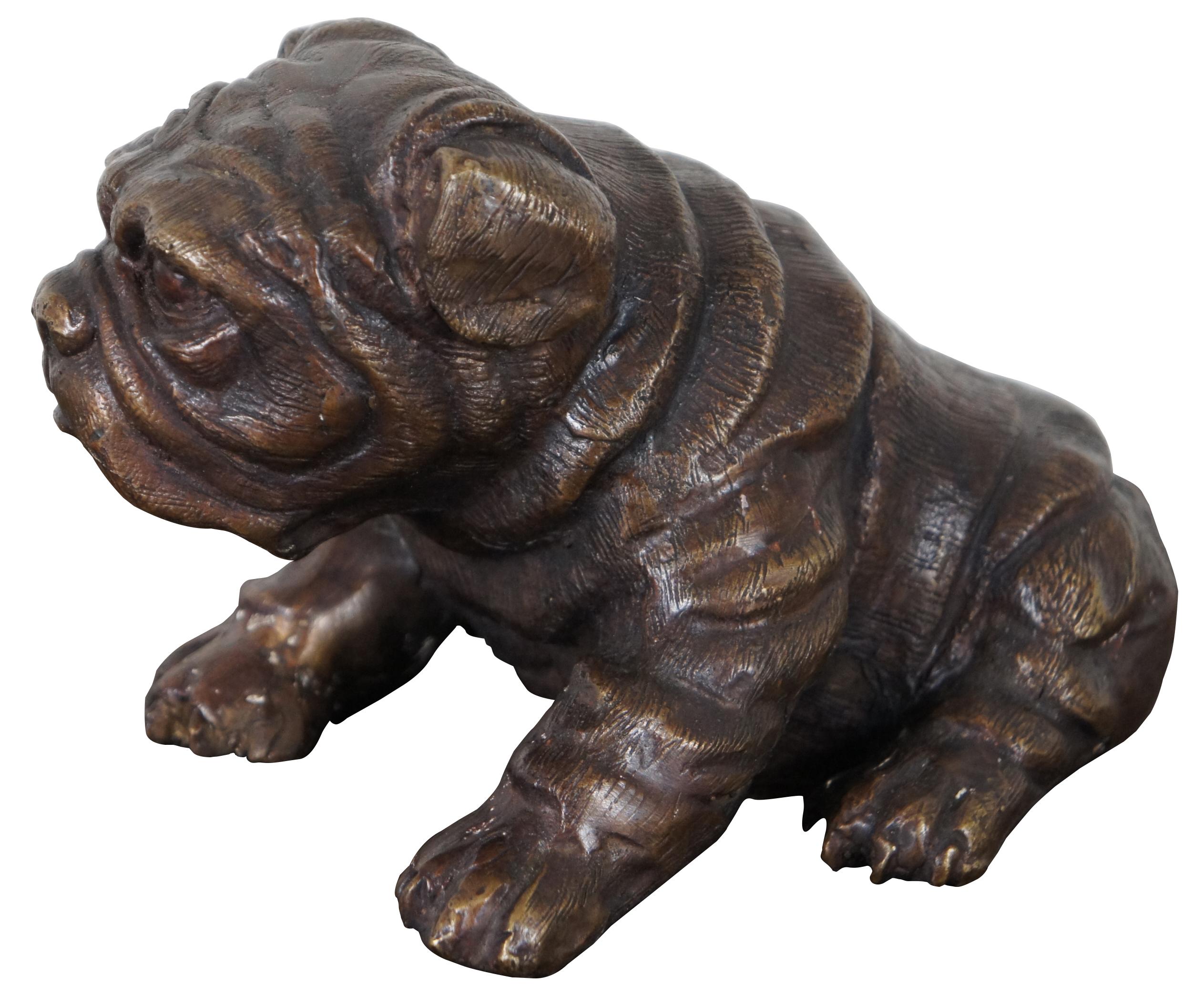 Vintage bronze figurine in the shape of a seated, wrinkly bulldog puppy. Measure: 9