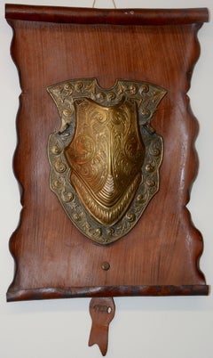 Bronze Shield on Rustic Leather Scroll Wall Hanging
