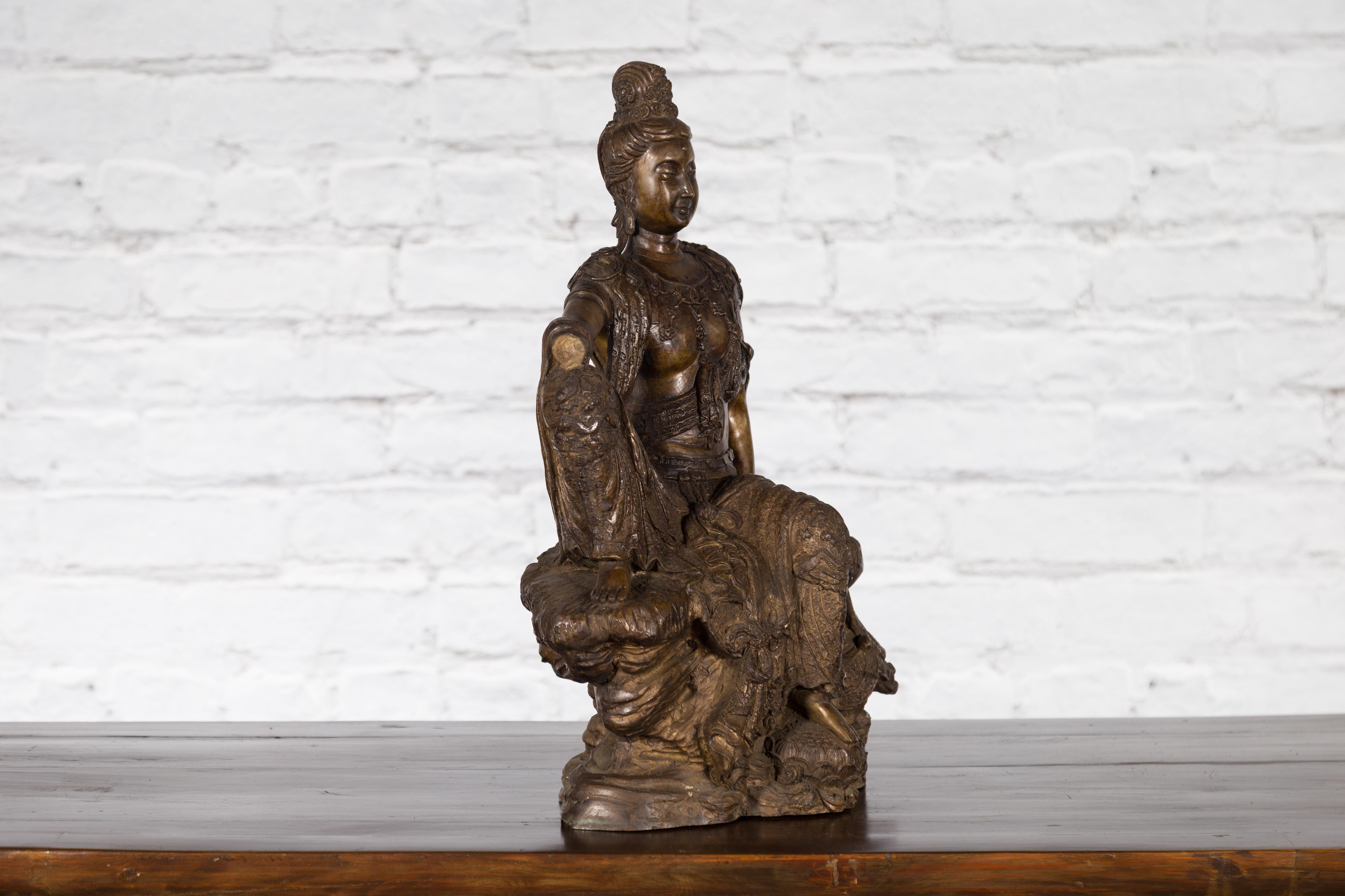 Vintage Bronze Statuette Depicting Quan Yin Seated on a Rocky Formation For Sale 7