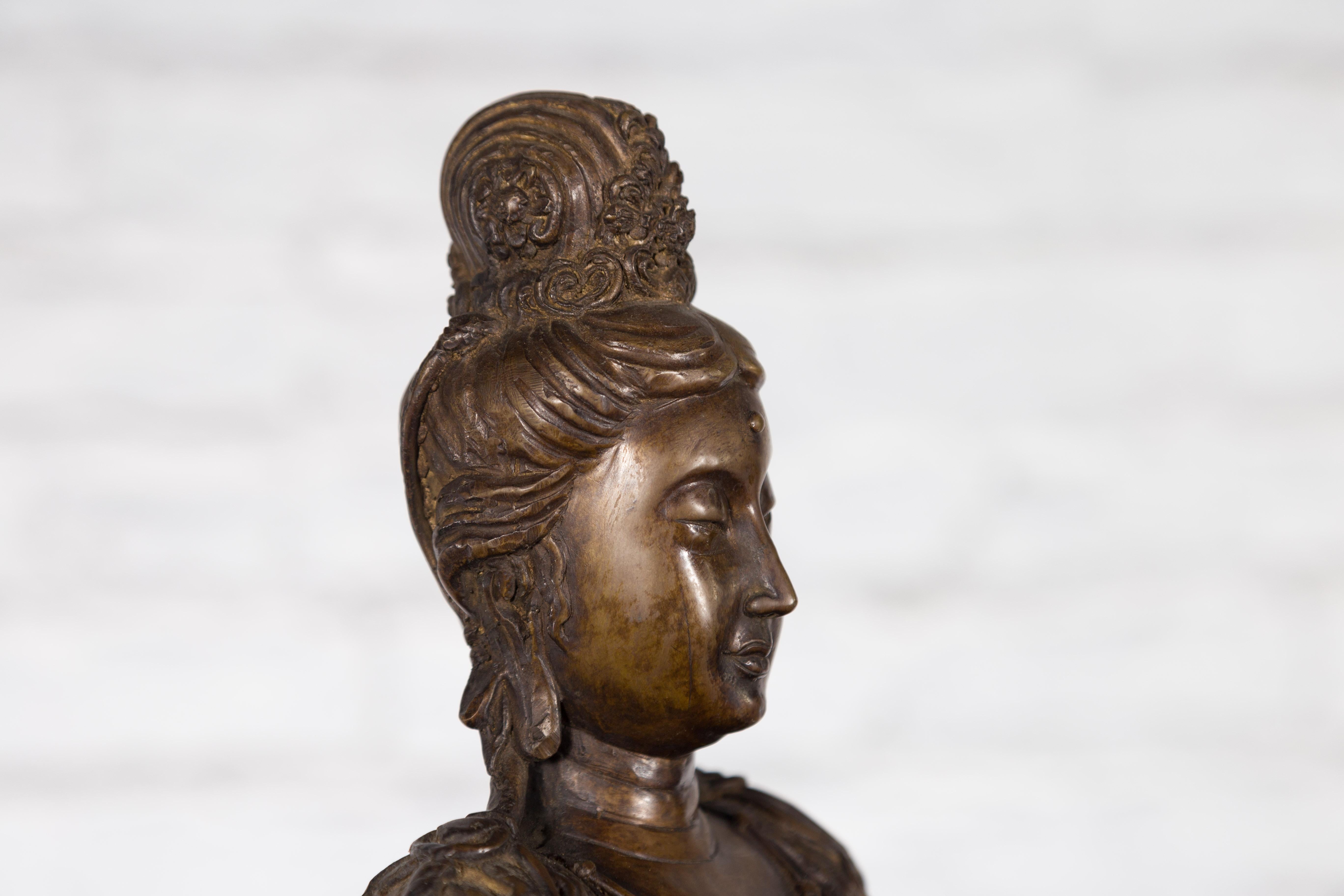 Vintage Bronze Statuette Depicting Quan Yin Seated on a Rocky Formation For Sale 8