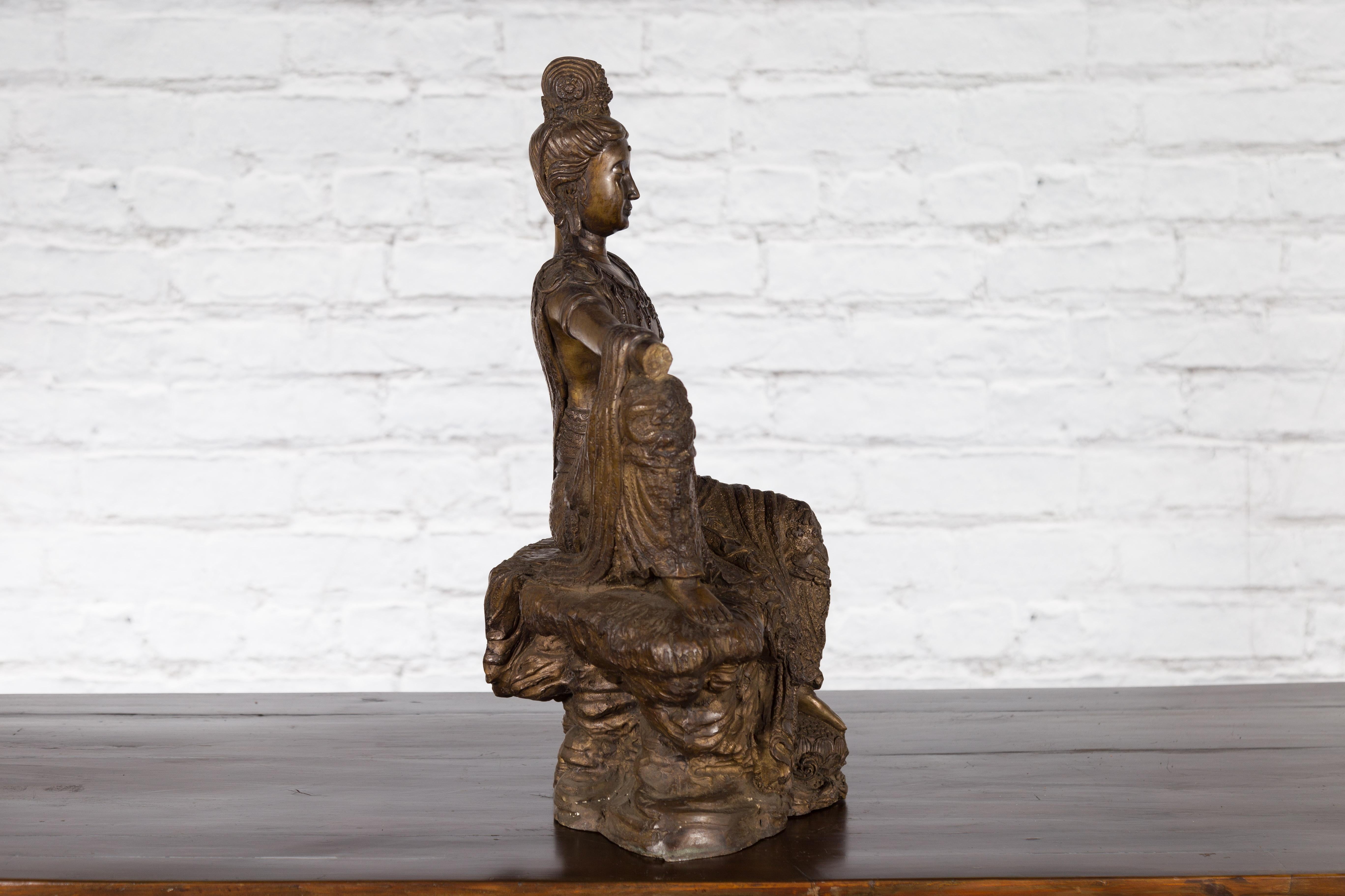 Vintage Bronze Statuette Depicting Quan Yin Seated on a Rocky Formation For Sale 9