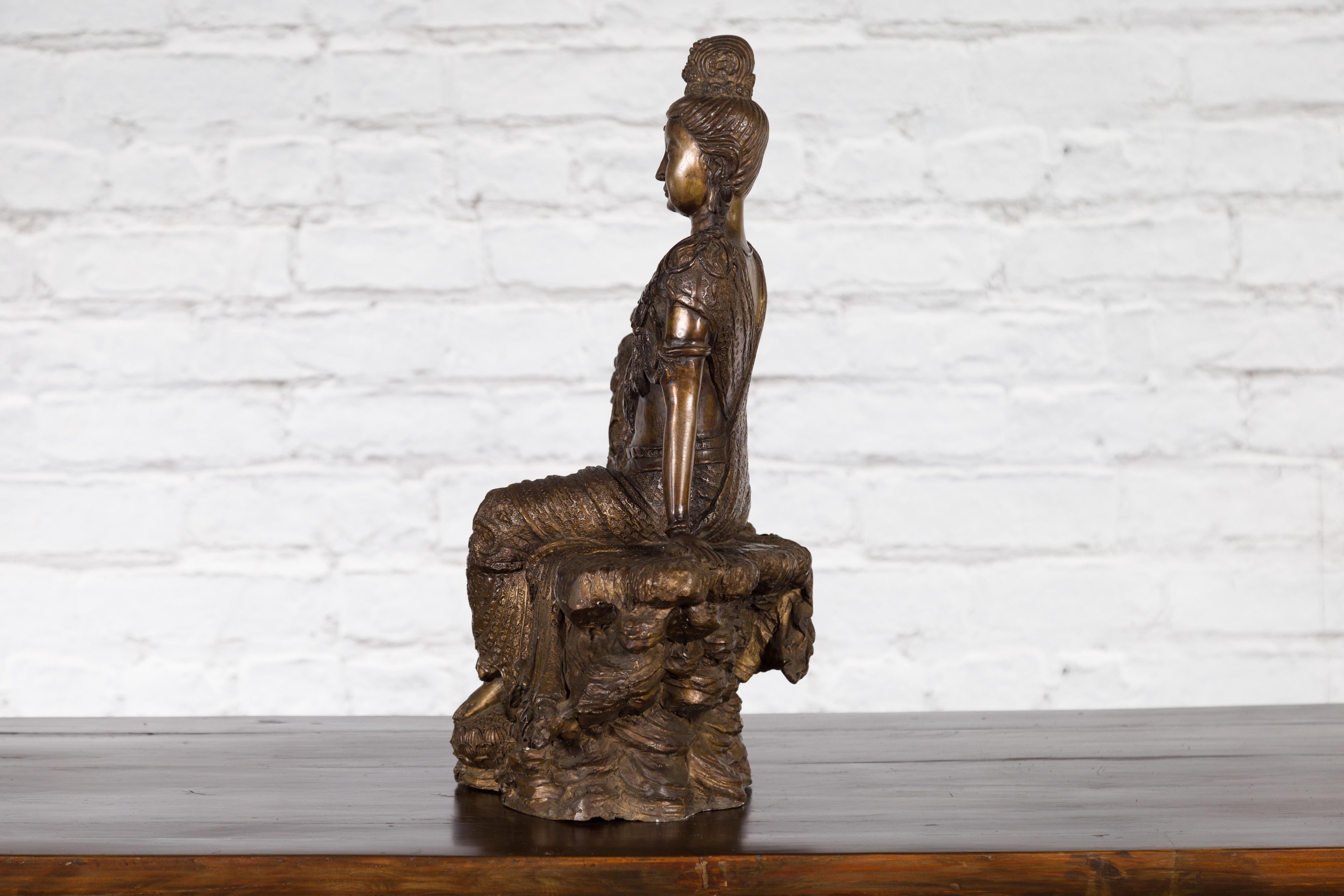 Vintage Bronze Statuette Depicting Quan Yin Seated on a Rocky Formation For Sale 11