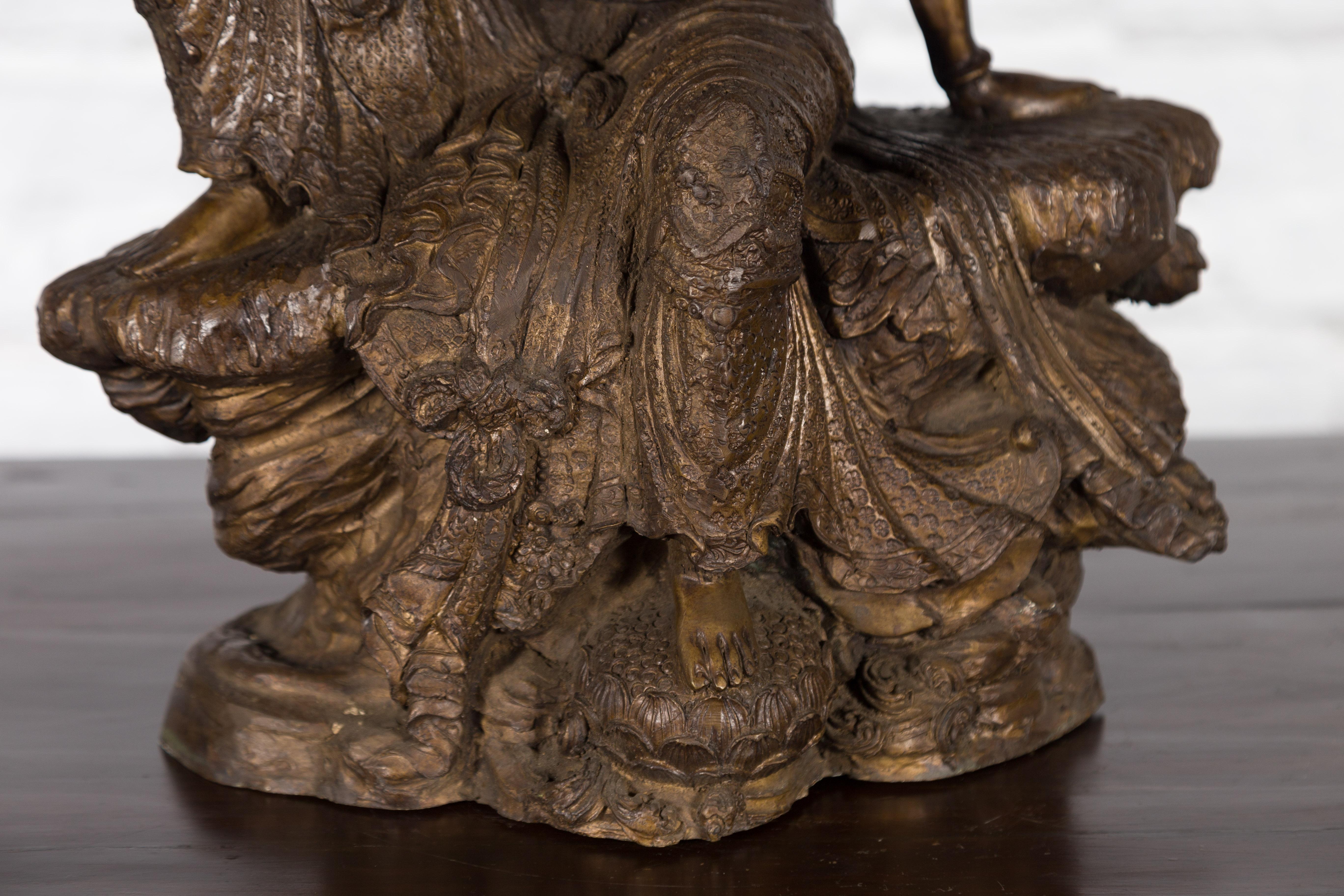 Vintage Bronze Statuette Depicting Quan Yin Seated on a Rocky Formation For Sale 3