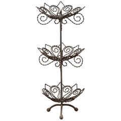 Vintage Bronze Three-Tiered Stand with Dark Patina and Scrolled Motifs