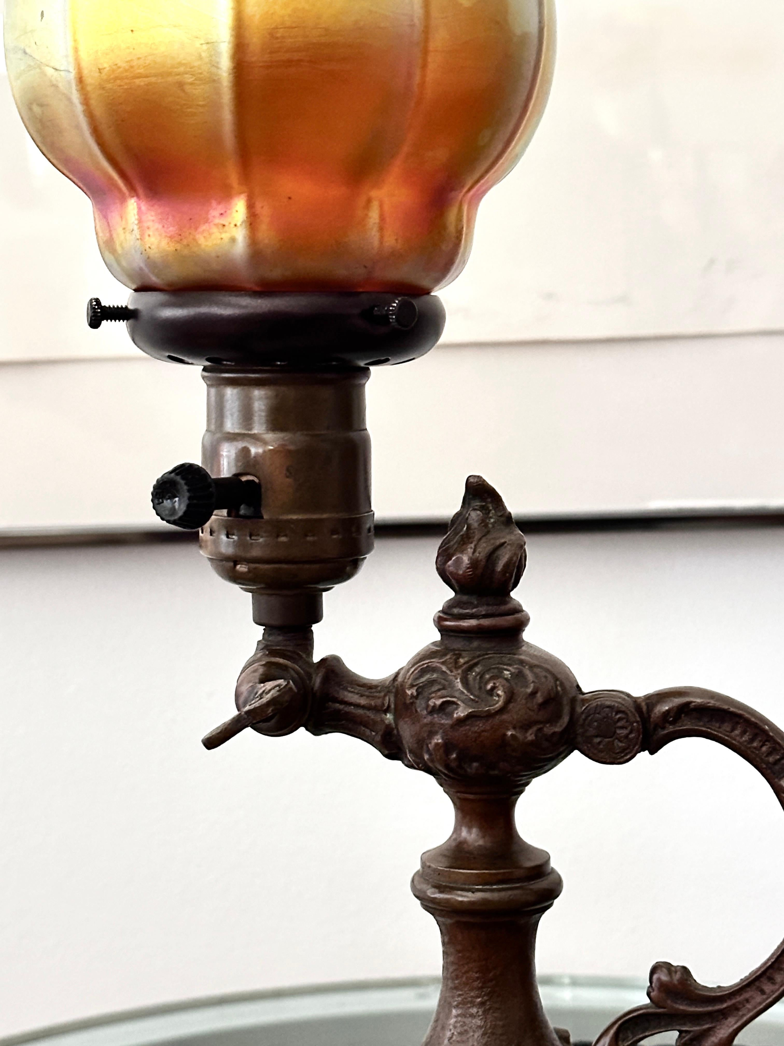 Early 20th Century Vintage Bronze Tiffany Style Table / Wall Lamp With Steuben Shade For Sale