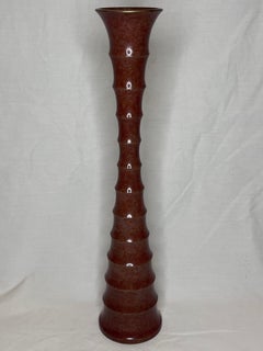 Vaso in bronzo vintage di ispirazione Brancusi con dettagli architettonici organici e moderni