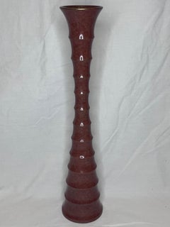 Vaso in bronzo vintage di ispirazione Brancusi con dettagli architettonici organici e moderni