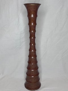 Vaso in bronzo vintage di ispirazione Brancusi con dettagli architettonici organici e moderni