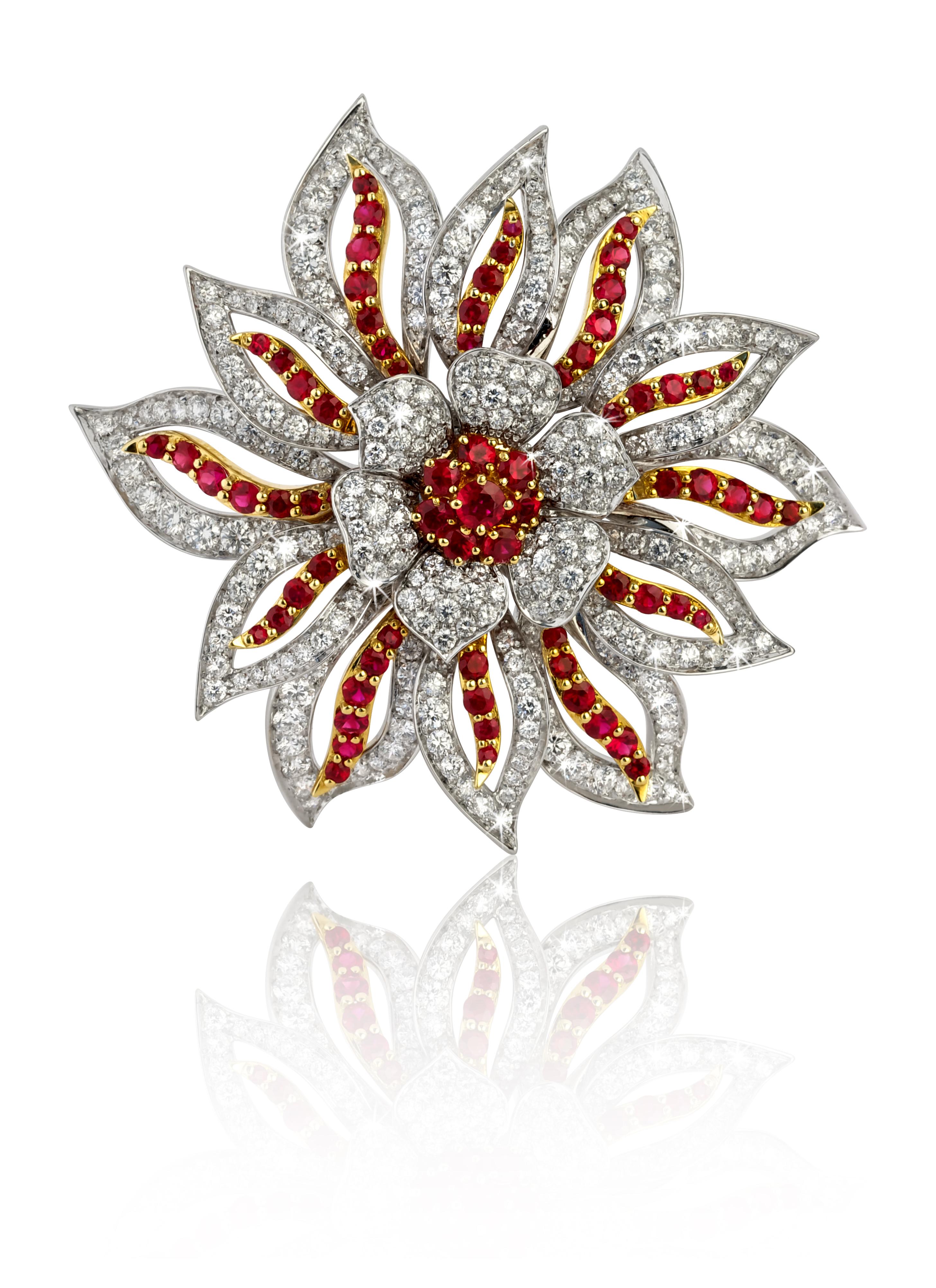 Vintage Brooch From ANGELETTI PRIVATE COLLECTION White and Yellow gold 18kt with Diamonds ct 8.59 and Rubies ct 5.20.
This Brooch was Manufactured in ‘60s in Italy by Expert Goldsmith from Valenza.
The Ruby are Set on Yellow gold to enhance their