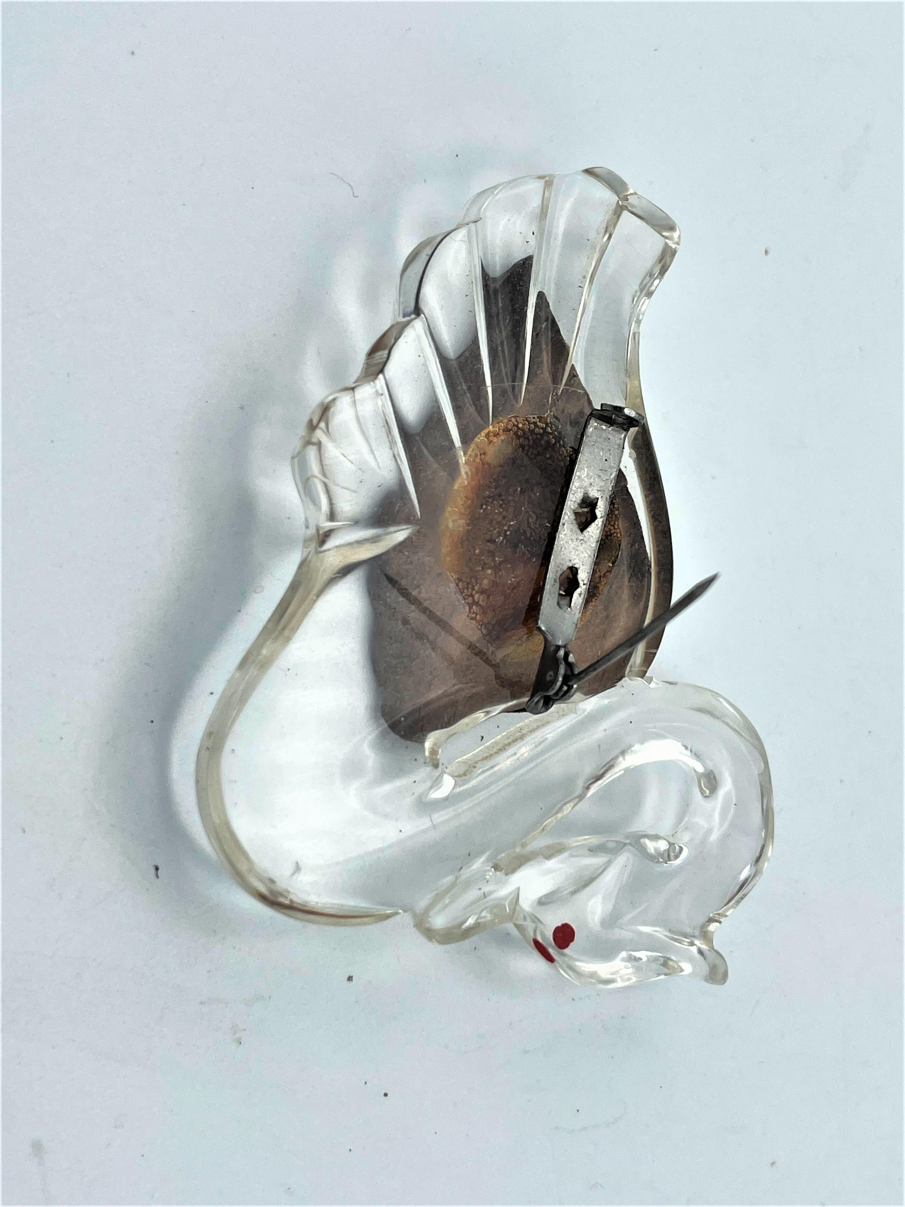 Vintage brooch in the shape of a swan made of clear Lucite and wooden wings 1940 For Sale 1