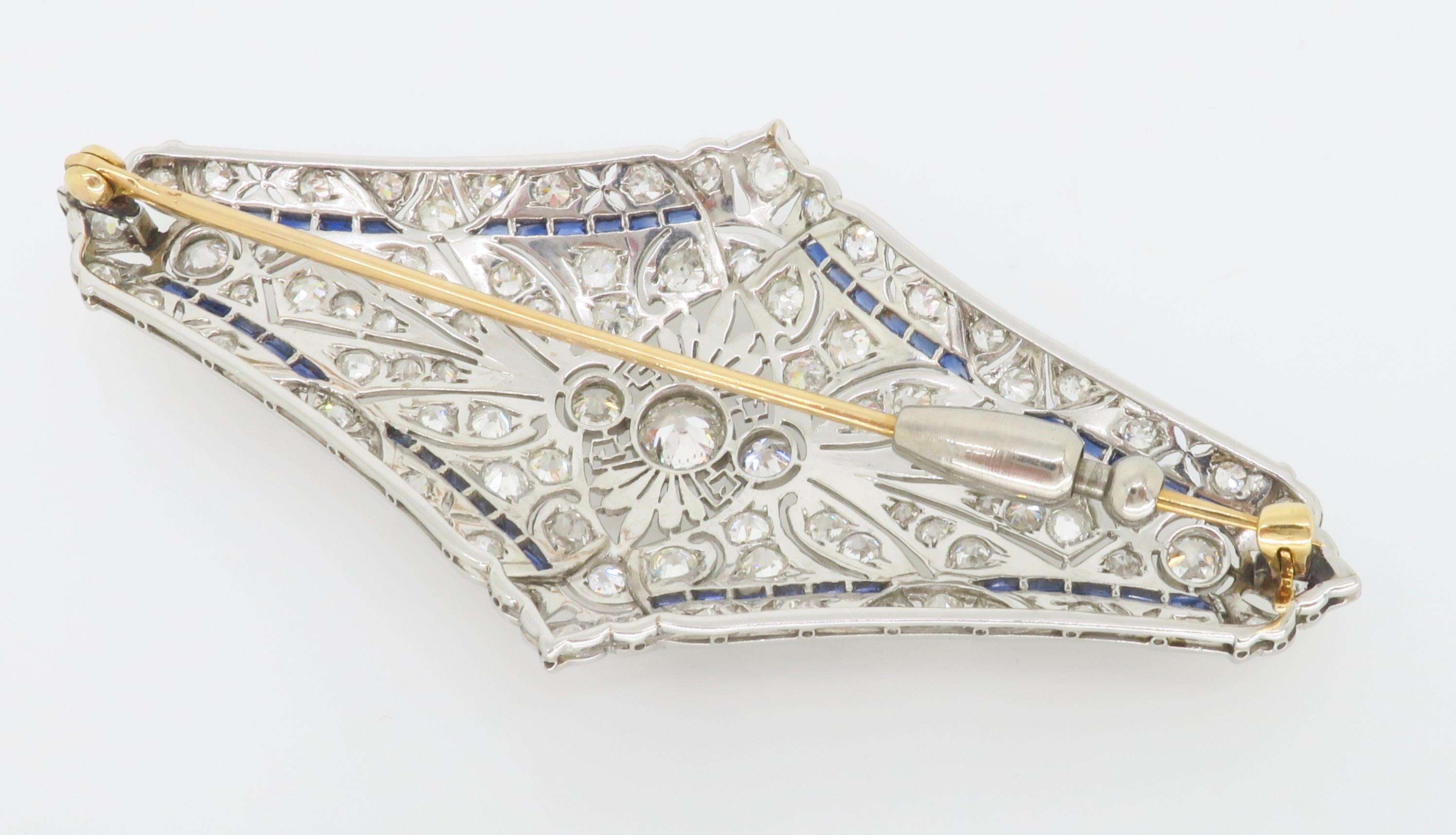 Old European Cut Vintage Brooch Made in Platinum with Diamonds & Blue Sapphires For Sale