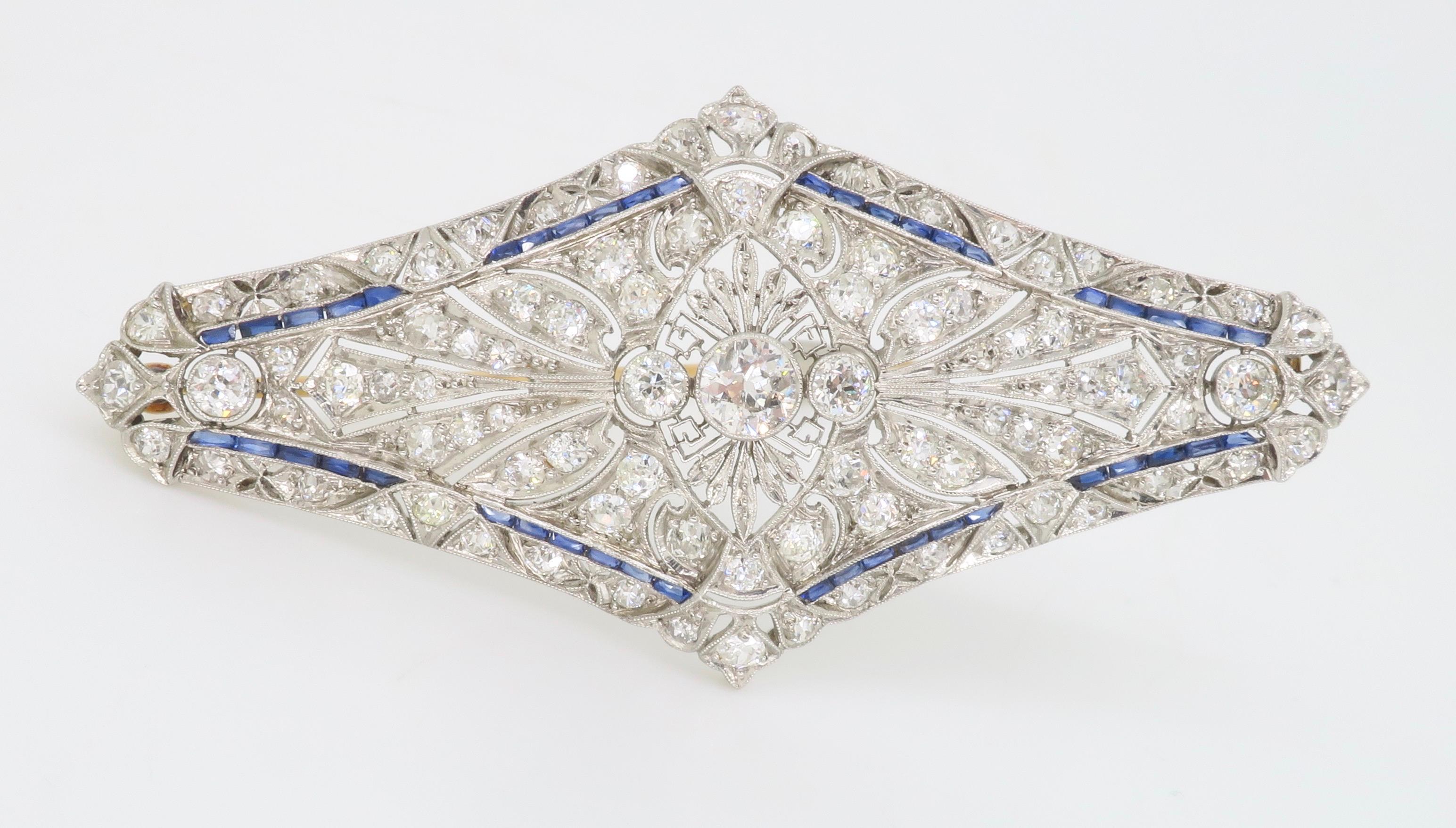 Women's or Men's Vintage Brooch Made in Platinum with Diamonds & Blue Sapphires For Sale