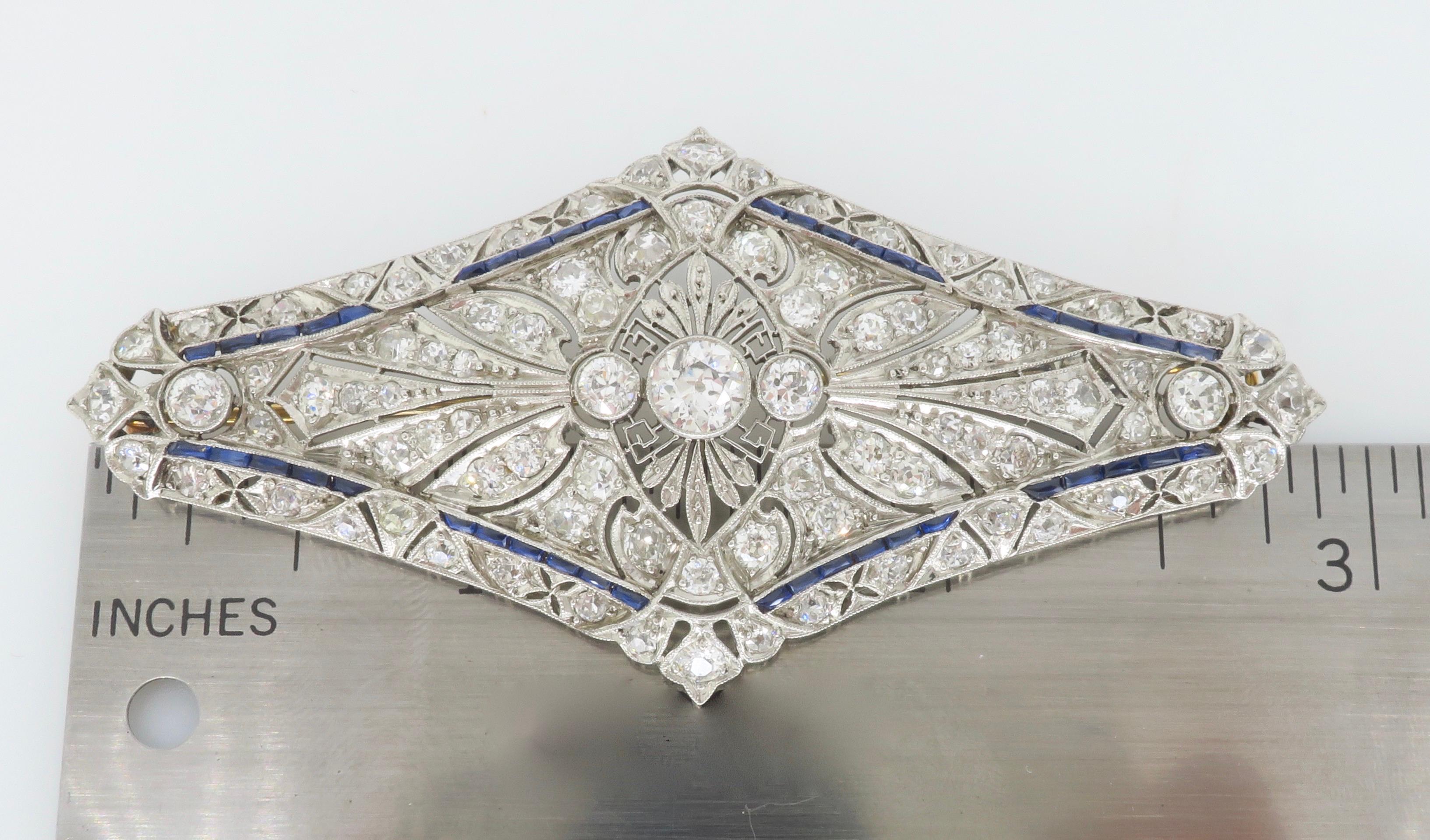 Vintage Brooch Made in Platinum with Diamonds & Blue Sapphires For Sale 1