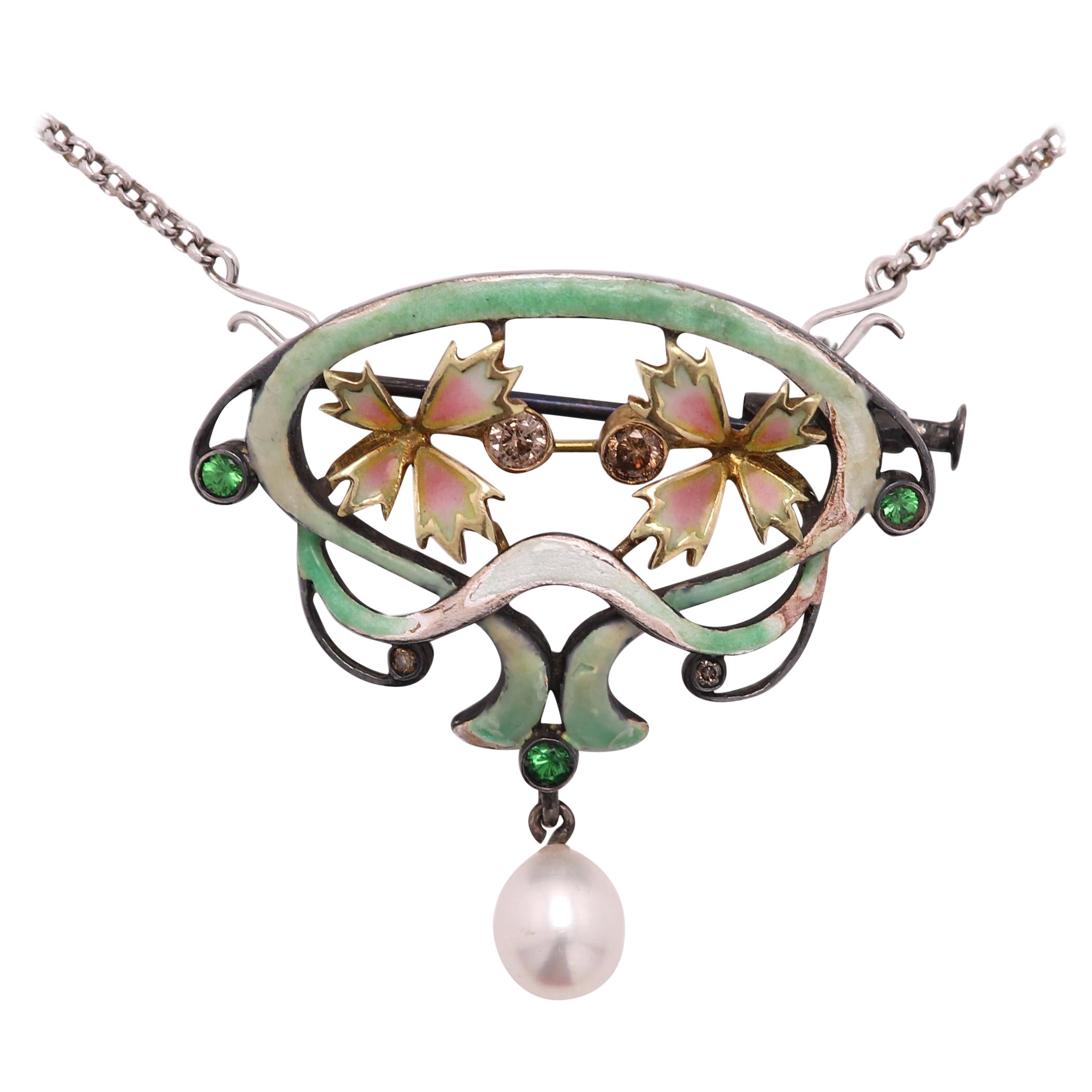 Vintage Hand made in Spain Enamel pendant/Brooch pin
can be used as a brooch or Necklace (chain /cord not included) 
Oxidized Sterling Silver 925 and 18k yellow Gold (in the flowers area)
approx size 1.5'  inch wide and 1.5' inch tall.
has few small