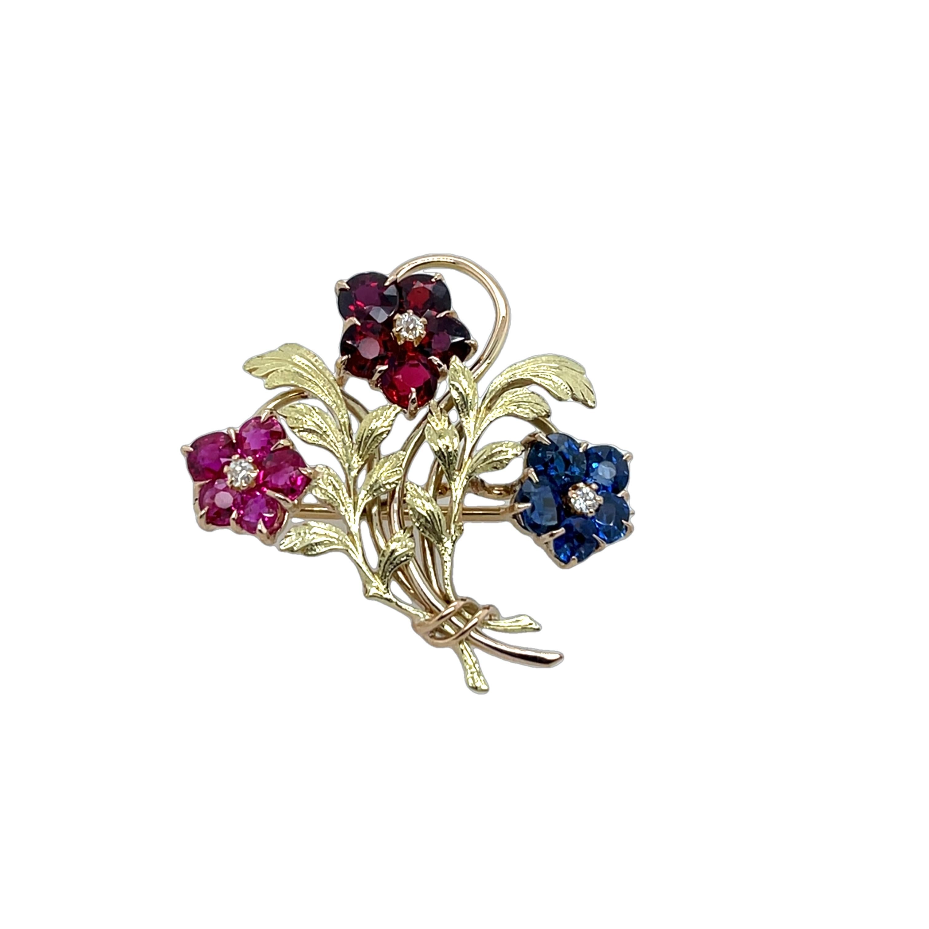 Round Cut Vintage Brooch, Set With Sapphires, Diamonds and Rubies For Sale