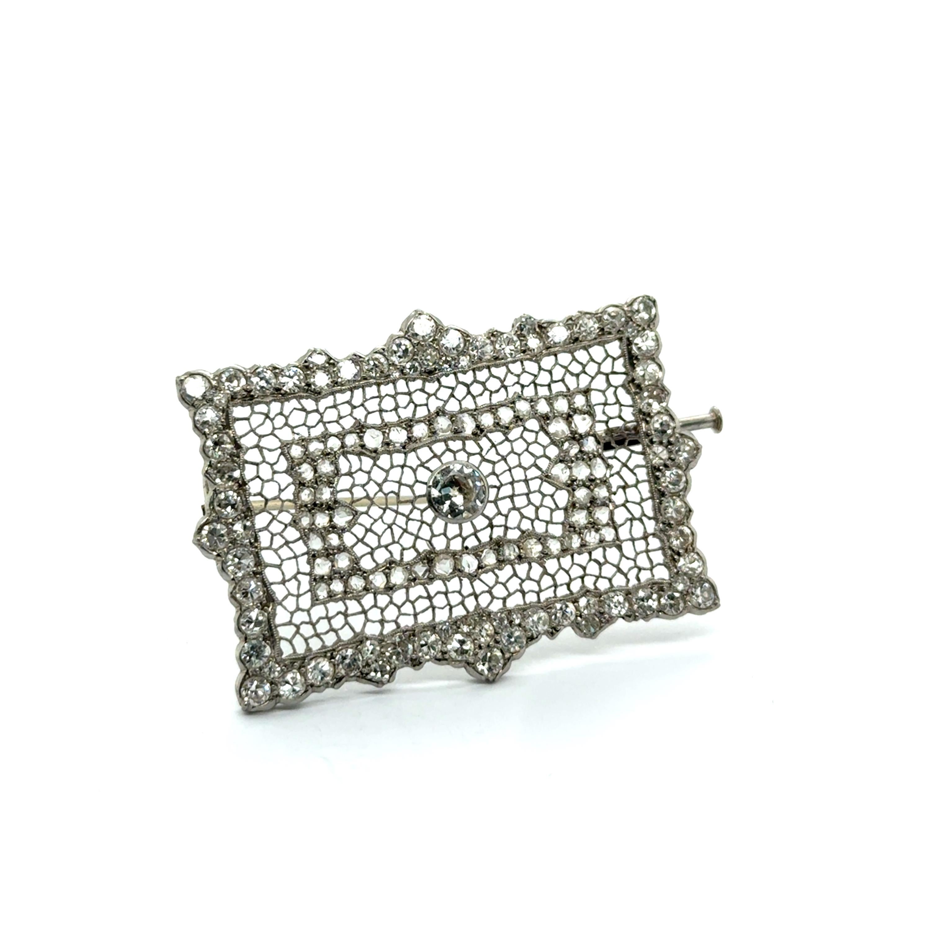 This elegant Buccellati brooch showcases the house’s signature lace-like craftsmanship in rich Platinum 950.

At its center sparks an old-cut diamond of 0.45 carat, G-H colour, si clarity, beautifully framed by 72 various-cut diamonds totaling 2.88