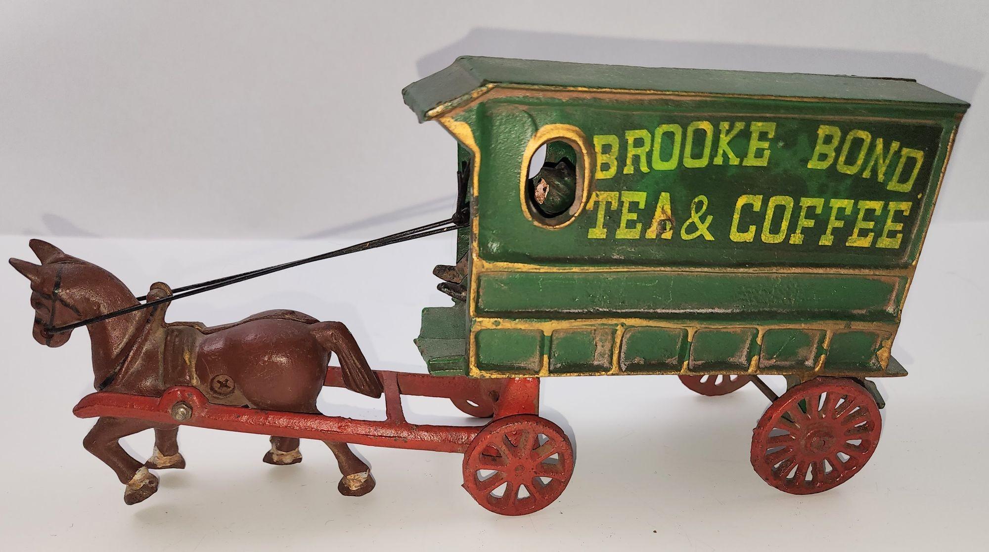 American Vintage Brooke Bond Tea and Coffee Cast Iron Horse and Wagon with Driver For Sale
