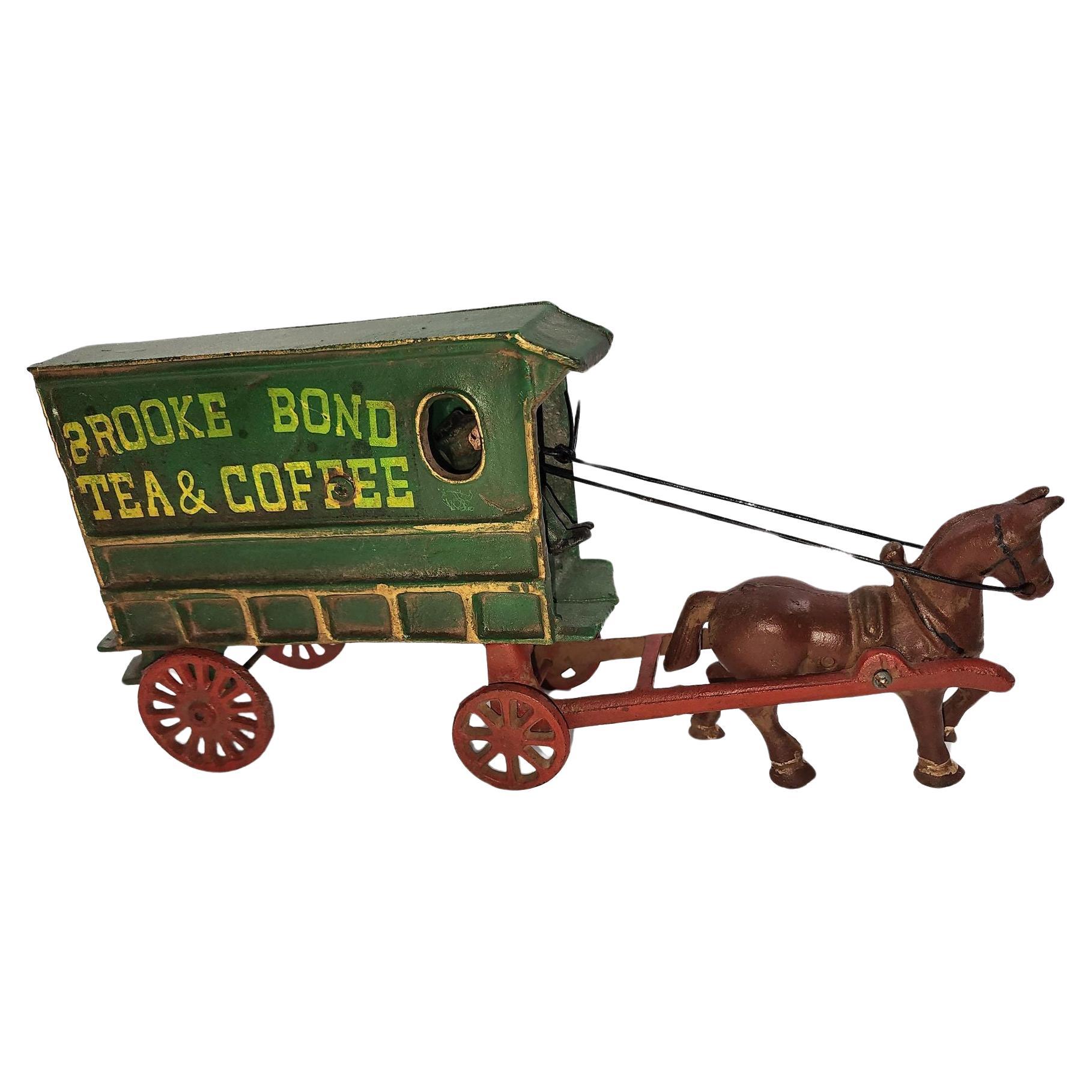 Vintage Brooke Bond Tea and Coffee Cast Iron Horse and Wagon with Driver For Sale