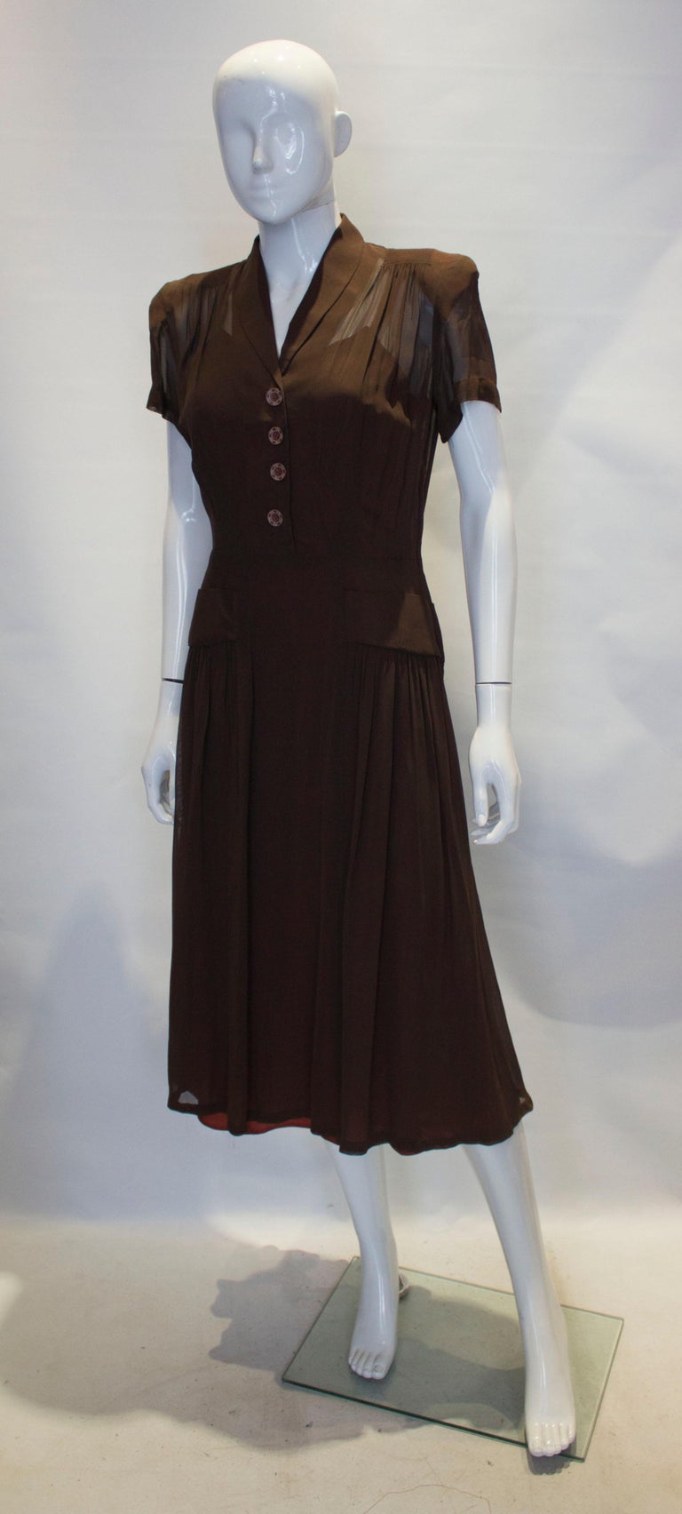 brown 1940s dress Stunning 1940s Hand-Crocheted Ribbon Dress in Chestnut Brown / Small –  Xtabay Vintage main image 0
