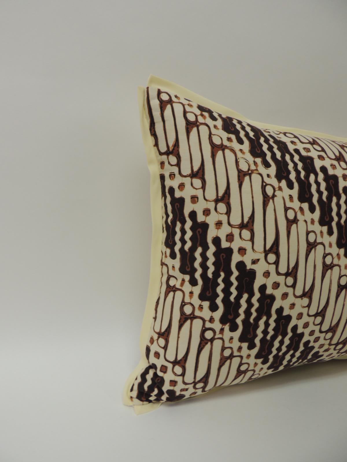 Vintage beige, brown and black Batik decorative lumbar pillow handcrafted with 1970s vintage lumbar hand-blocked Batik artisanal textile panel with the traditional tribal design in shades of brown, black, natural and with a mocha color detail.