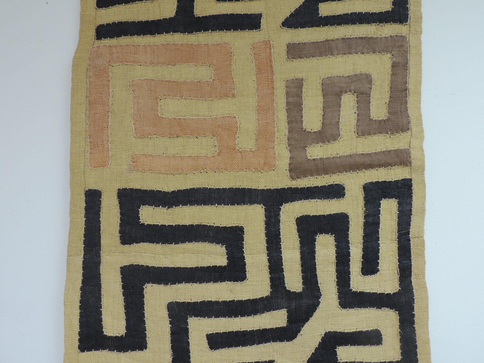 Vintage Graphic Orange Brown and Black Earth Tones African Applique Kuba Applique Textile.
Patchwork and embroidered applique design and tribal woven pattern.
In shades of brown, black, camel, taupe and natural.
The word “Kuba” means “lighting”