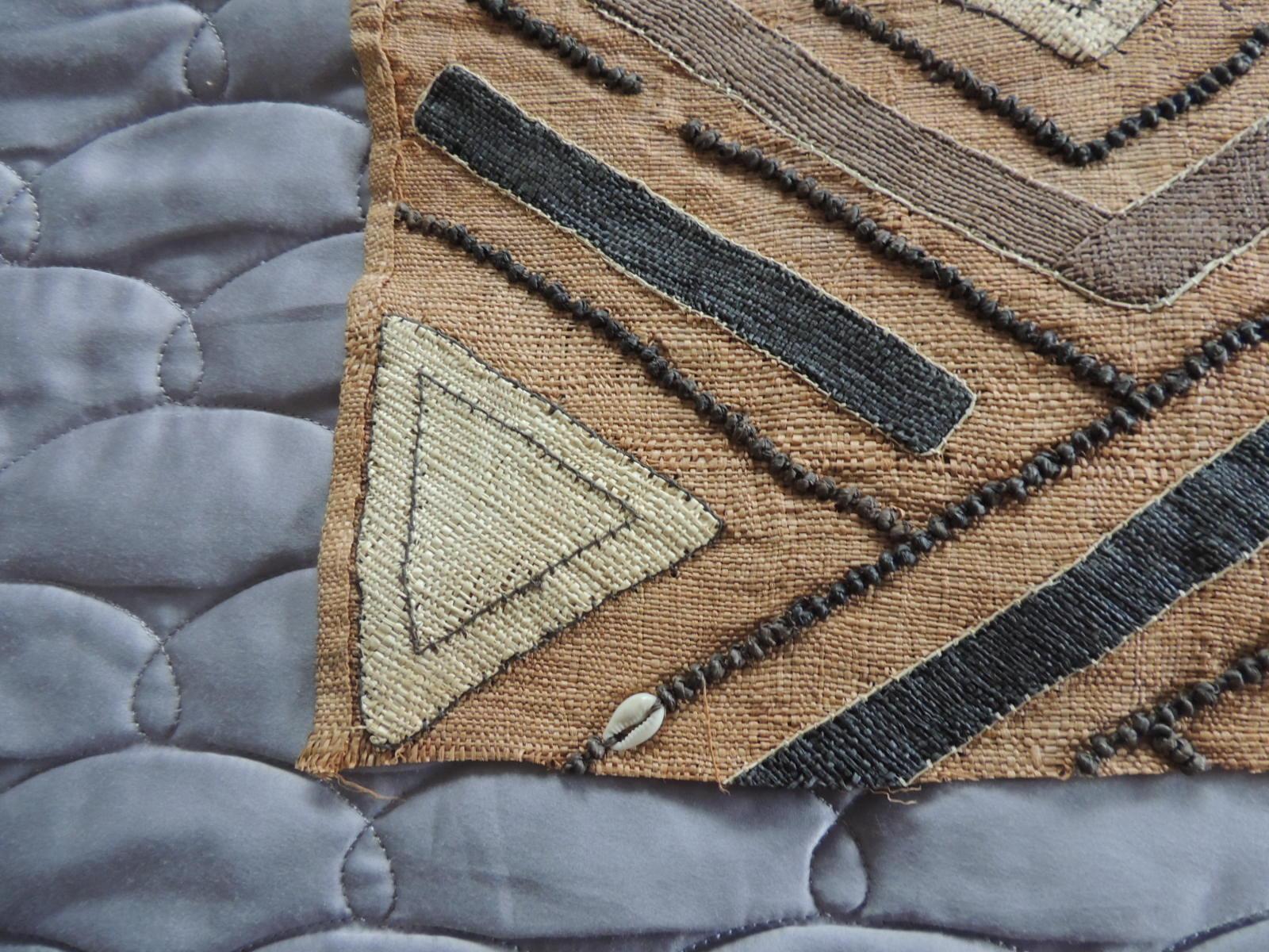 Vintage brown and Black Earth Tones African Applique Kuba Textile Fragment.
Patchwork and embroidered applique design and tribal woven pattern. Embroidered wood beads and cowrie shells.
In shades of brown, black, camel, taupe and natural.
Sold as