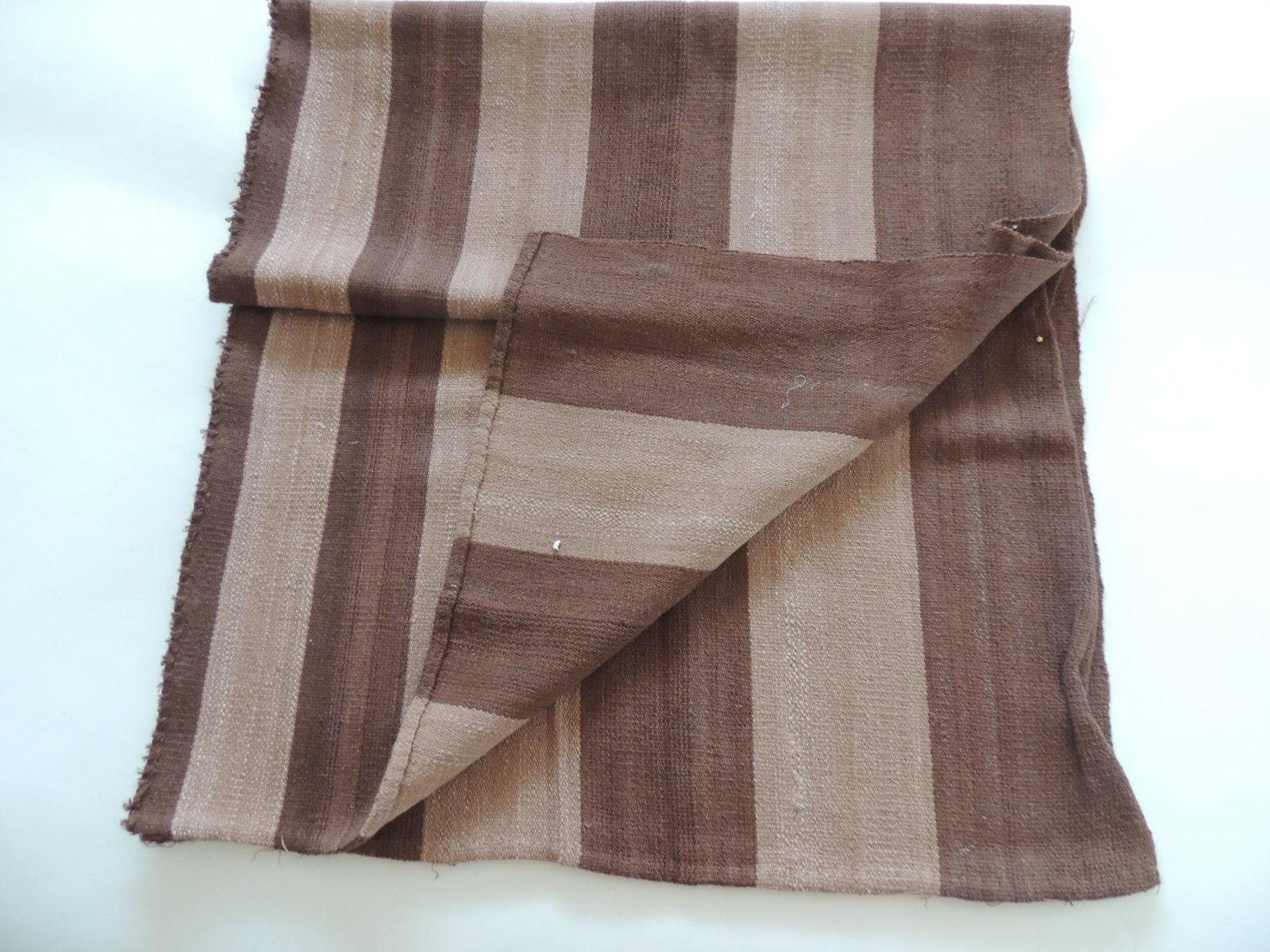 Vintage brown and camel woven textile.
Was a throw and was cut up, ideal for
pillows or upholstery.
Size: 24