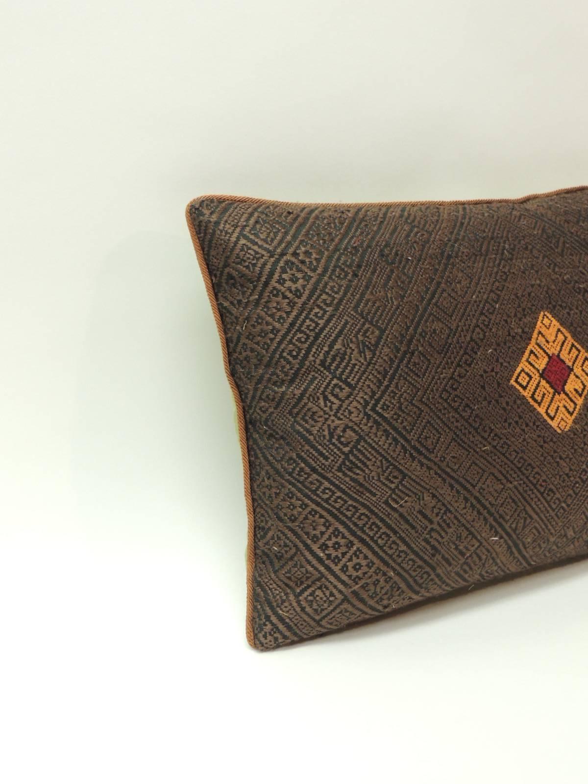 Vintage brown and orange tribal woven silk petite decorative pillow
Vintage brown and orange tribal woven silk petite decorative pillow. Throw pillow handcrafted with a small silk woven tribal brown textile with an orange and red pattern center.