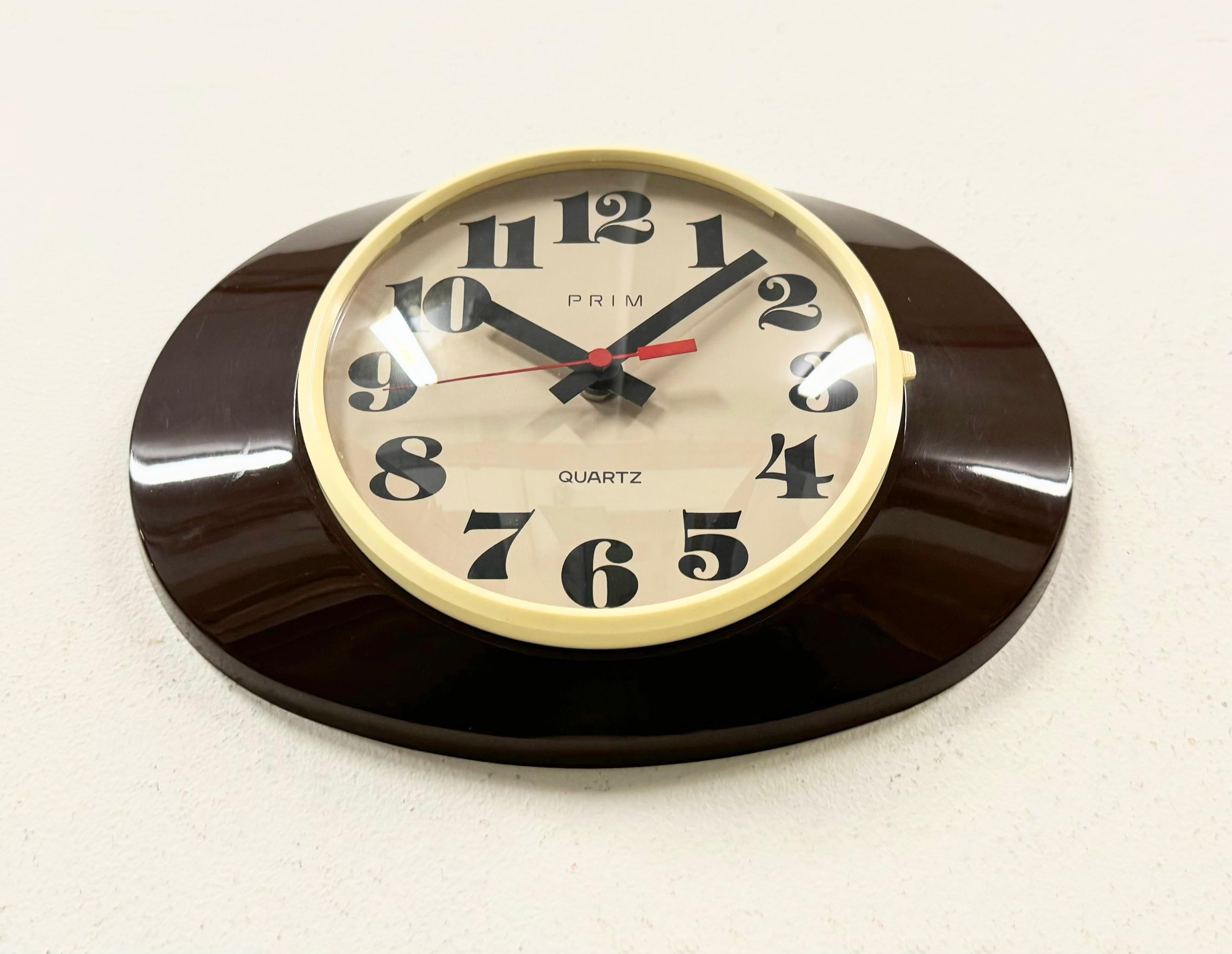 Czech Vintage Brown Bakelite Wall Clock from Prim, 1970s For Sale