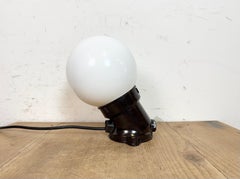 Applique vintage in bachelite marrone con vetro al latte, anni '70