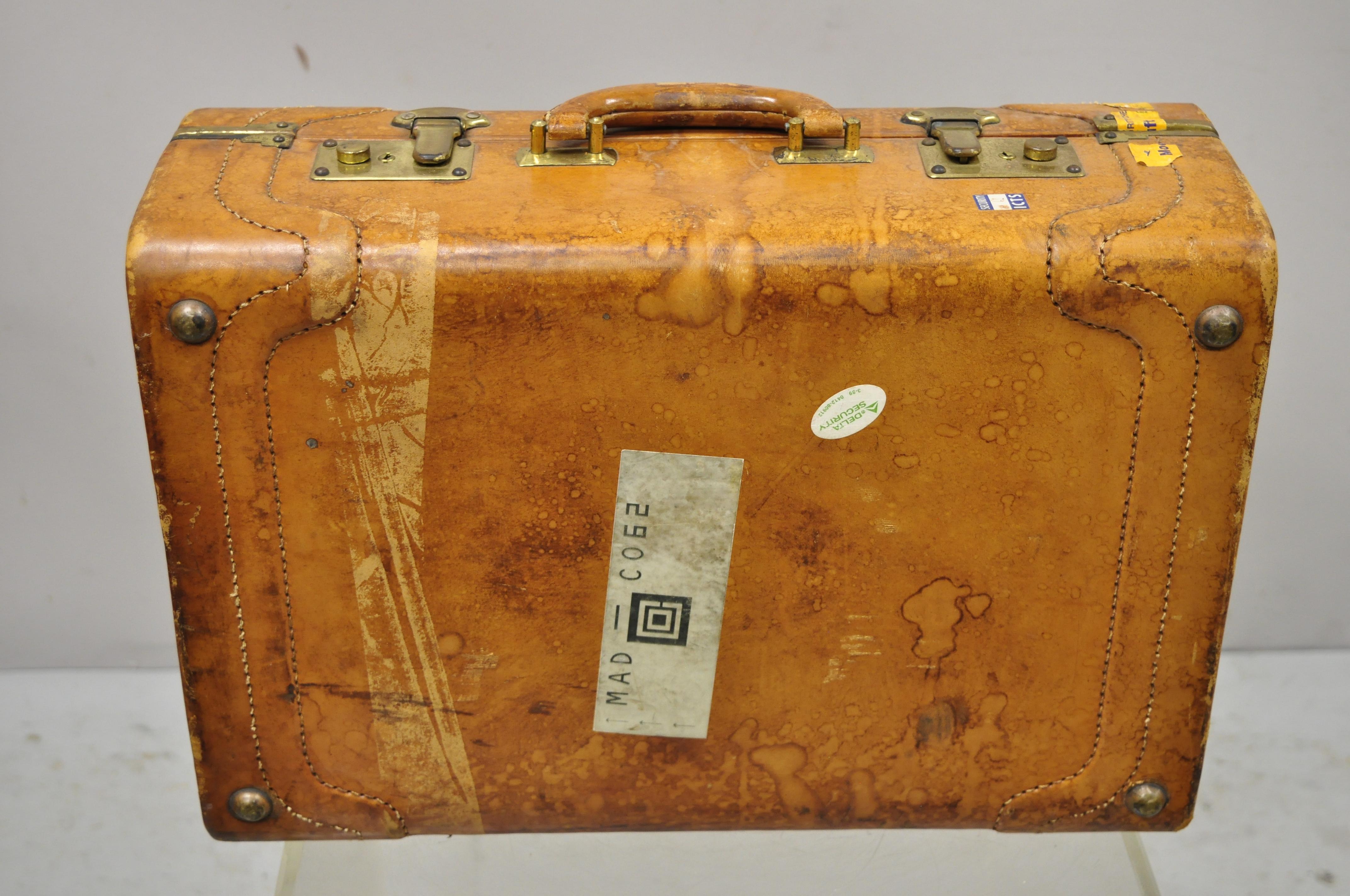 brown leather suitcase