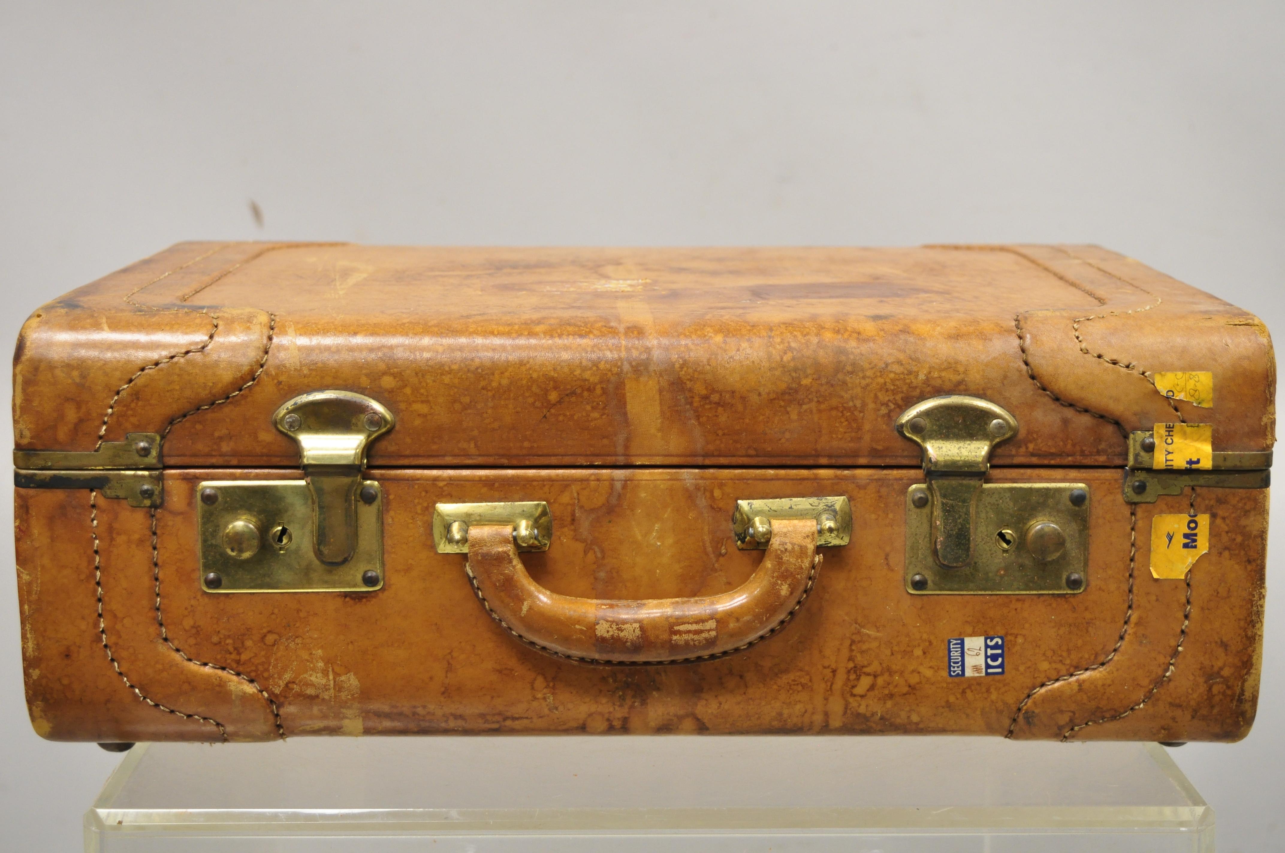 brown leather suitcase