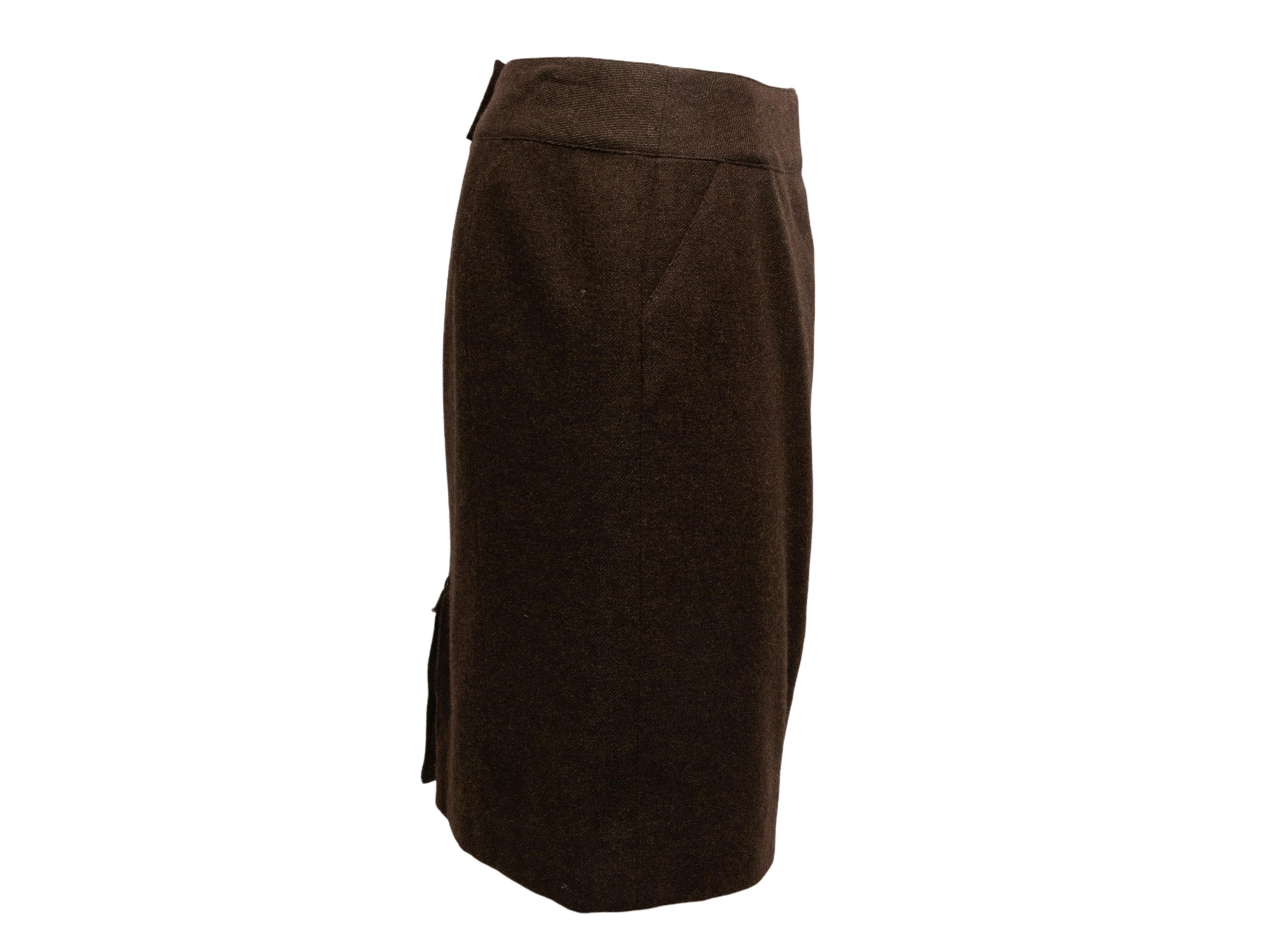  Vintage brown cashmere pencil skirt by Chanel. From the Fall/Winter 1999 Collection. Dual hip pockets. Back zip and button closures. 30