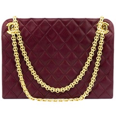Vintage Brown Chanel Handbag with Gold-Colored Strap