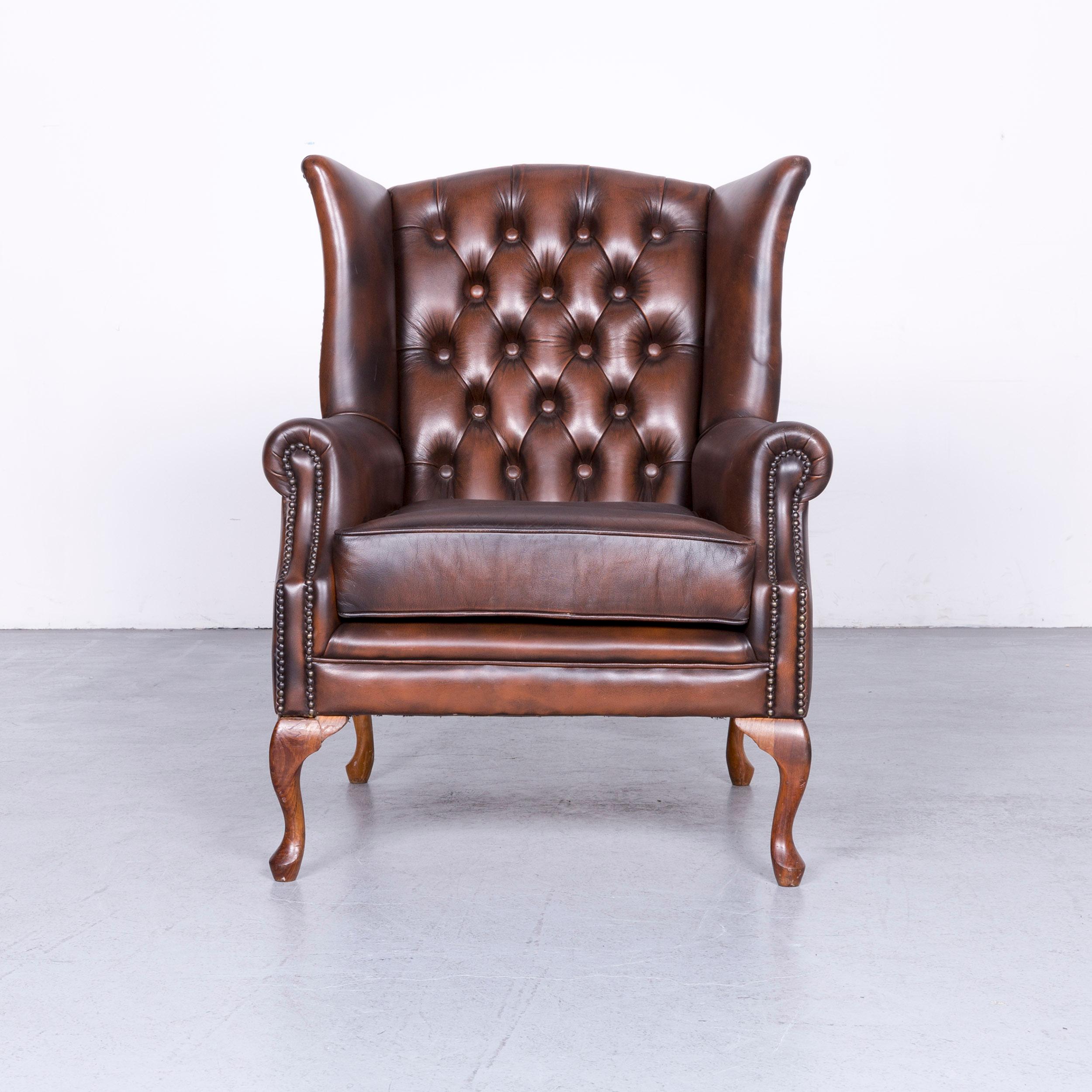 We bring to you a vintage brown chesterfield leather armchair buttoned clubchair.