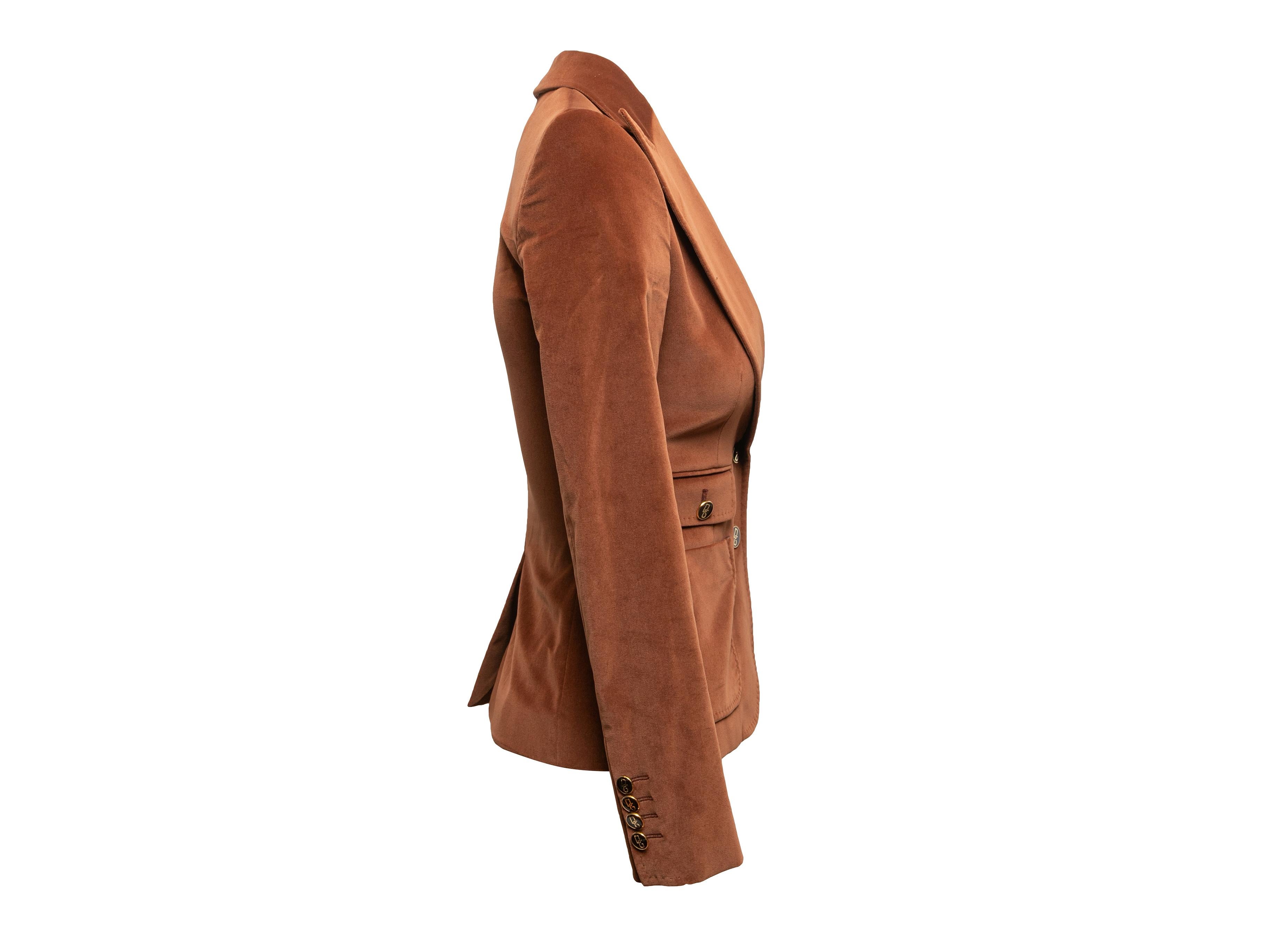 Vintage brown velvet blazer by Dolce & Gabbana. Circa 2000s. Peaked lapel. Three pockets. Front button closures. 32