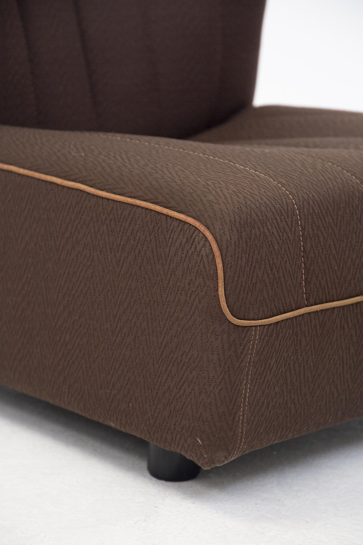 The brown fabric modular sofa was designed by Tito Agnoli for the fine Italian manufacturer Arflex in the 1960s.
The sofa is modular, i.e. it can be disassembled as you wish with respect to your needs.
The sofa is entirely made of brown fabric