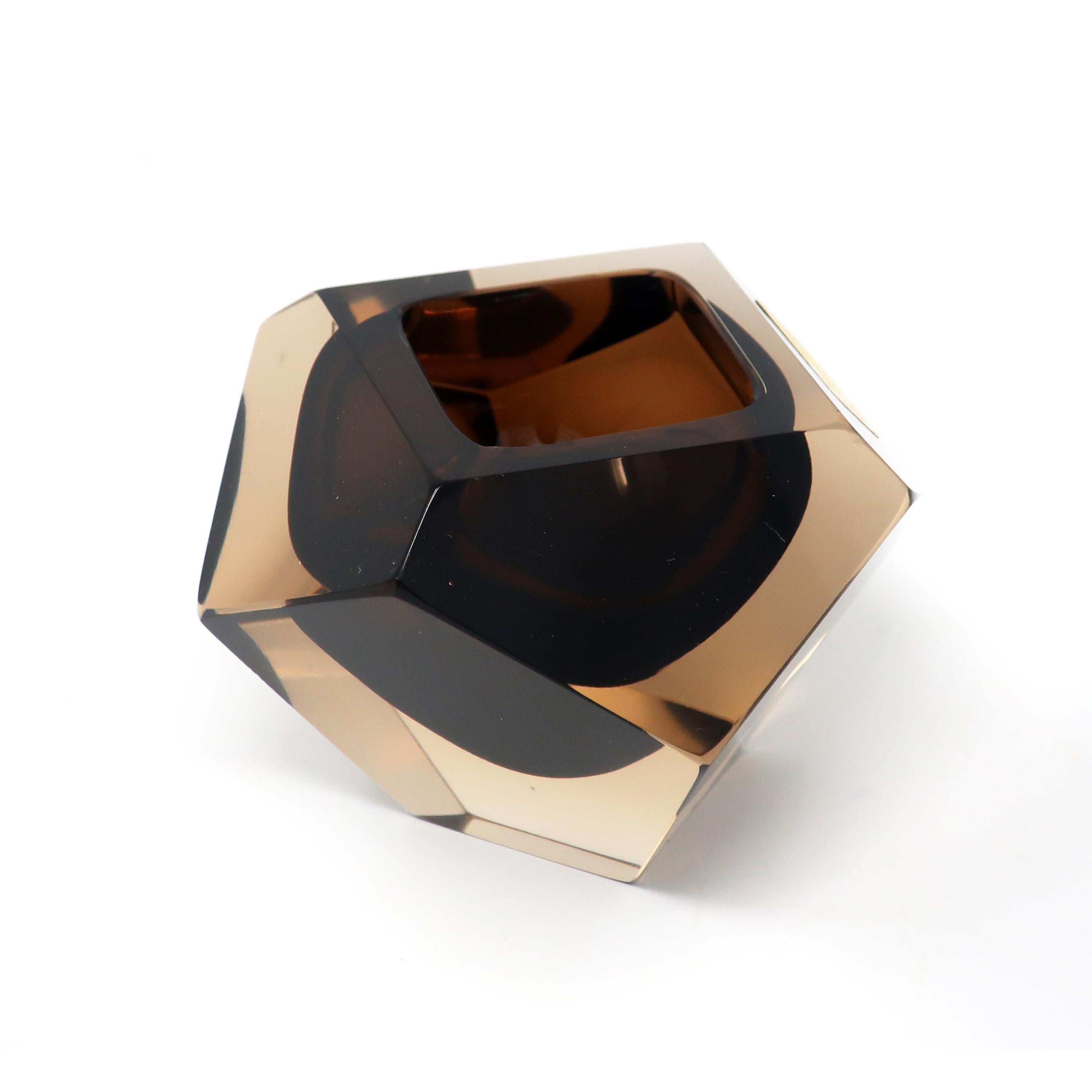 A gorgeous brown and clear glass ashtray by V. Nason & C. The dark brown glass is encased in an angular block of light brown glass utilizing the renowned Italian Sommerso technique in the style of Flavio Poli for Seguso Vetri d'Arte and Alessandro