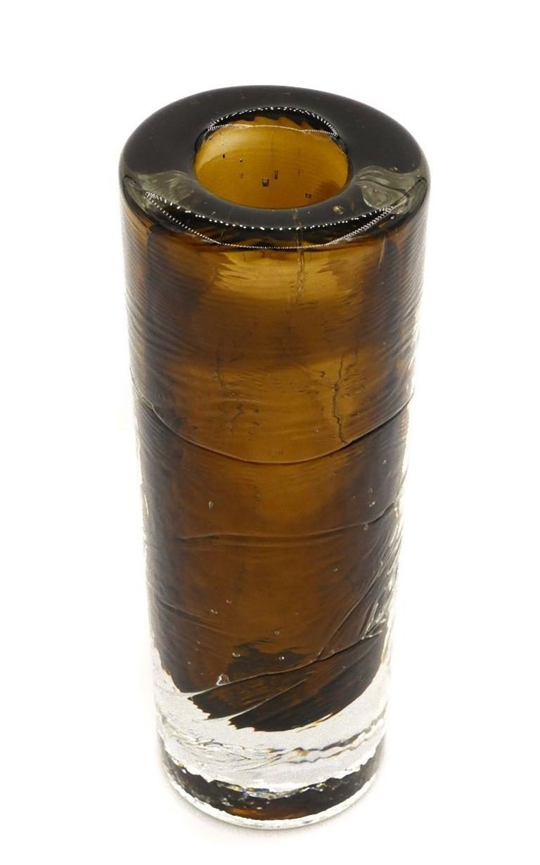 This vintage brown glass vase is a decorative object manufactured in Northern Europe circa 1970s.

Thick vase in brown glass. 

Dimensions: cm 20 x 7 (diameter).

In excellent conditions.