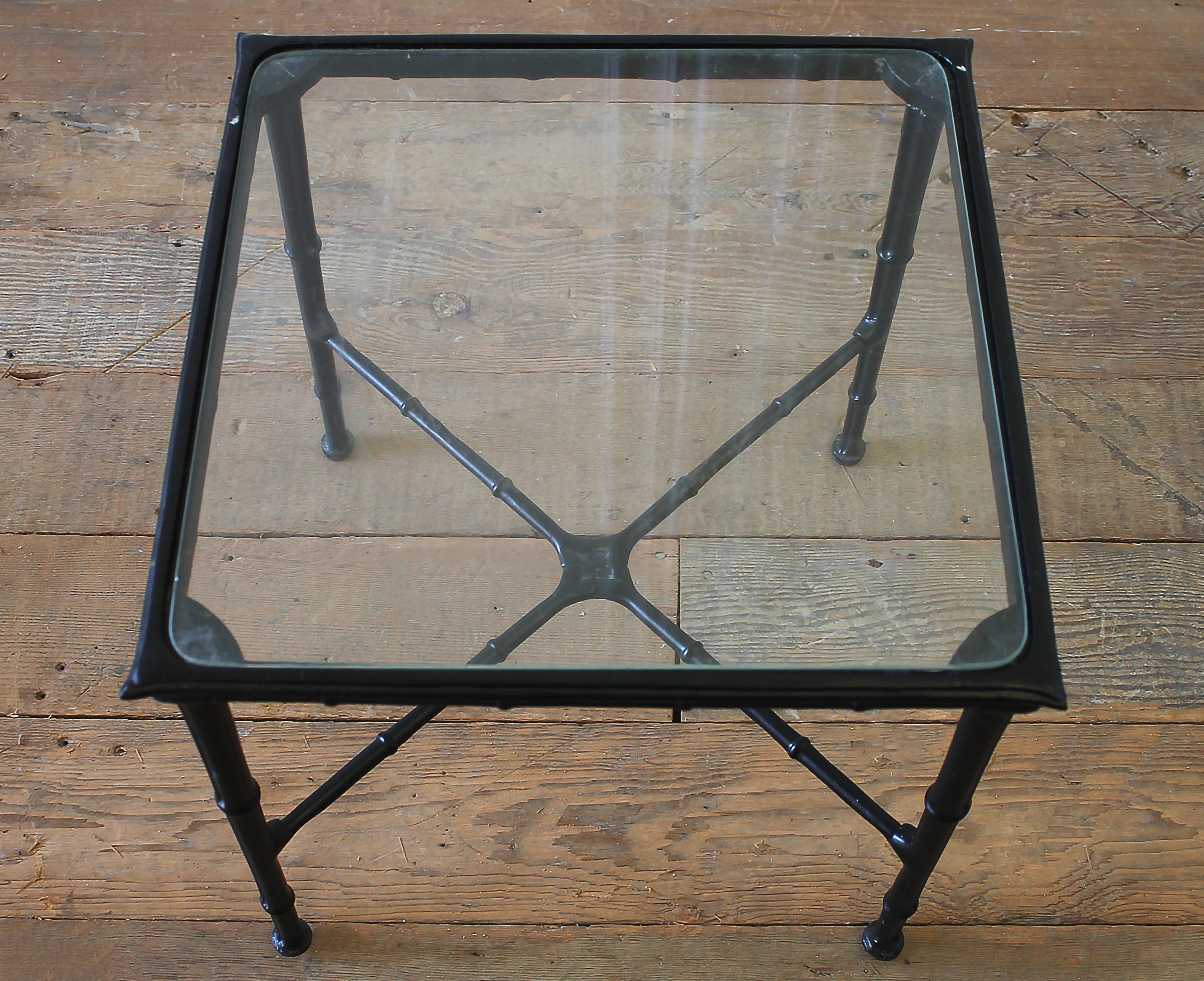 Brown Jordan Calcutta faux bamboo, Chinese Chippendale pattern patio furniture.
Set of two tables with glass tops. Black painted tables.
Measures: 17