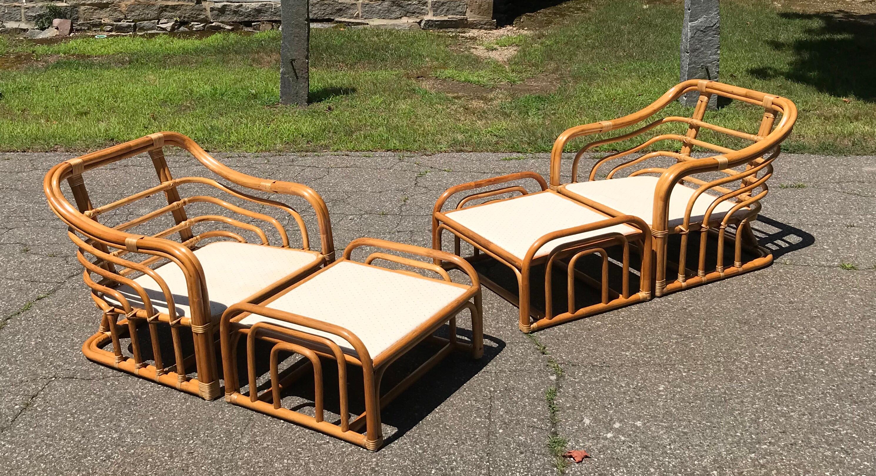 Vintage brown Jordan rattan lounge chairs with ottomans. Chairs measure 30