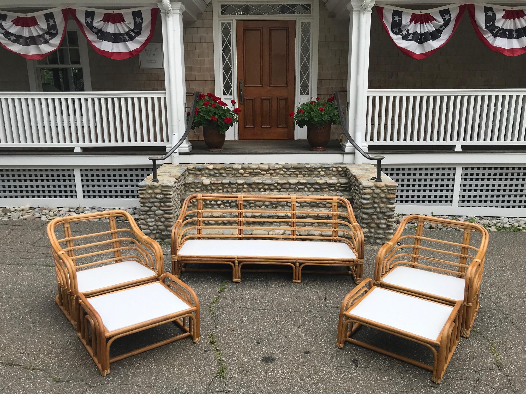 Beautiful vintage, five piece Brown Jordan Rattan patio set comprised of a sofa, two lounge chairs and two ottomans. All pieces have clean white decking and are ready for your custom cushions which we can provide locally before shipment of the